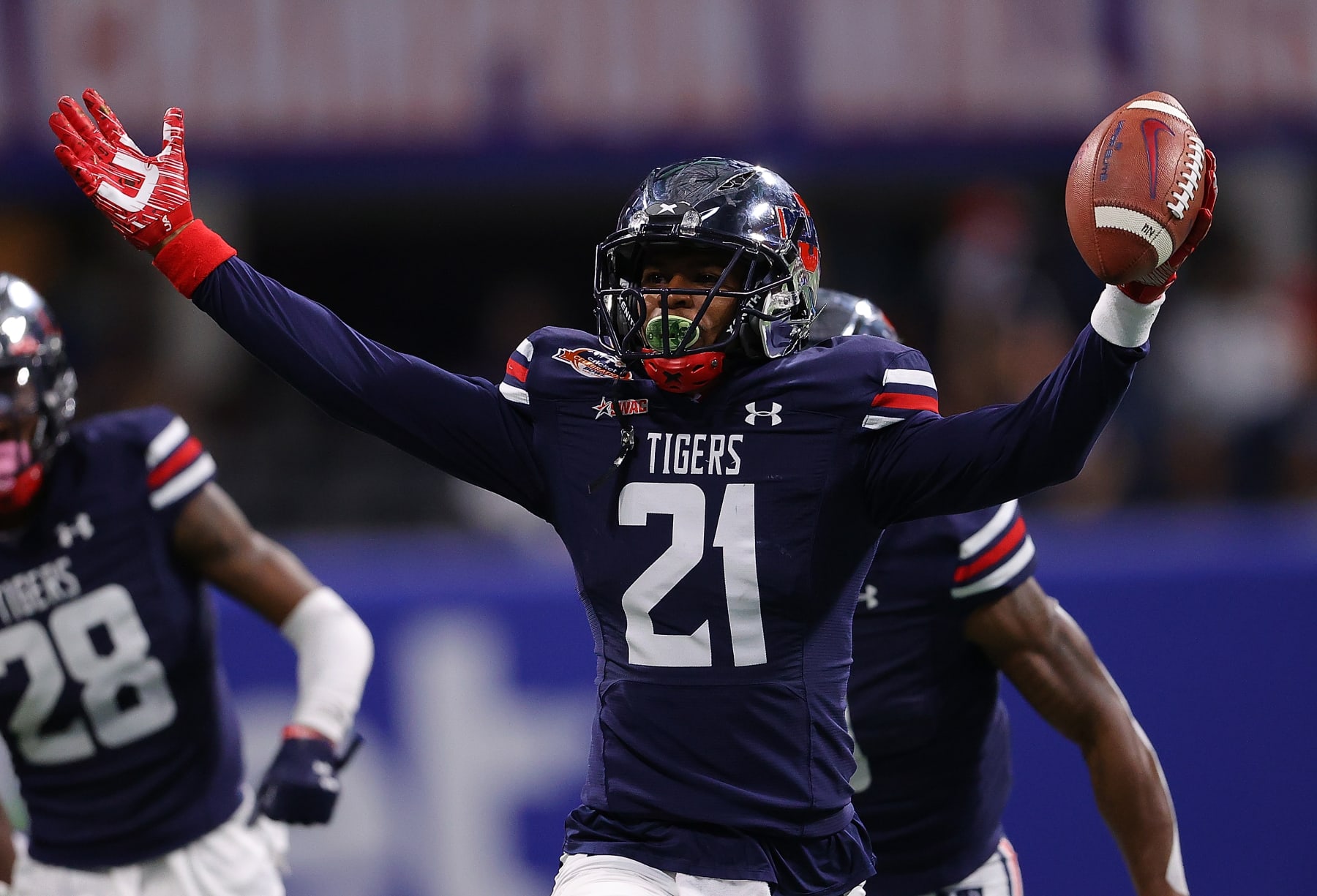 ATLANTA, GEORGIA - DECEMBER 18:  Shilo Sanders #21 of the Jackson State Tigers reacts after intercepting a pass by the South Carolina State Bulldogs during the first half of the Cricket Celebration Bowl at Mercedes-Benz Stadium on December 18, 2021 in Atlanta, Georgia. (Photo by Kevin C. Cox/Getty Images)