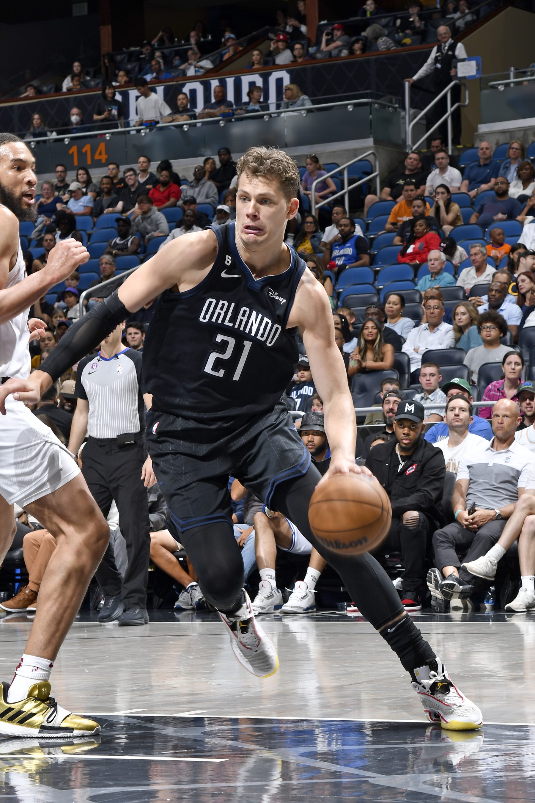 ORLANDO, FL - APRIL 6: Moritz Wagner #21 of the Orlando Magic drives to the basket against the Cleveland Cavaliers  on April 6, 2023 at Amway Center in Orlando, Florida. NOTE TO USER: User expressly acknowledges and agrees that, by downloading and or using this photograph, User is consenting to the terms and conditions of the Getty Images License Agreement. Mandatory Copyright Notice: Copyright 2023 NBAE (Photo by Gary Bassing/NBAE via Getty Images)