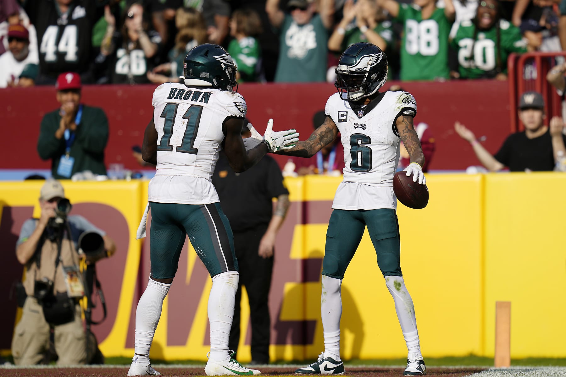 LANDOVER, MARYLAND - OCTOBER 29: DeVonta Smith #6 celebrates a fourth quarter touchdown with A.J. Brown #11 of the Philadelphia Eagles during a game against the Washington Commanders at FedExField on October 29, 2023 in Landover, Maryland. (Photo by Jess Rapfogel/Getty Images)