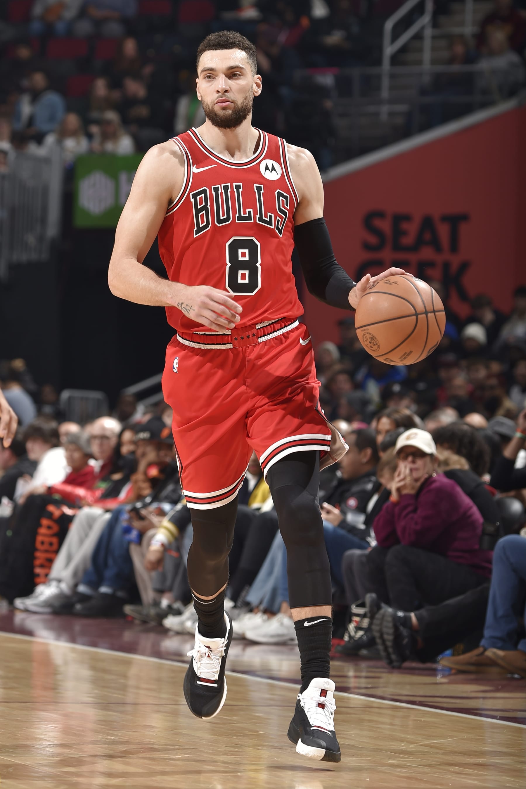 CLEVELAND, OH - JANUARY 15:  Zach LaVine #8 of the Chicago Bulls dribbles the ball during the game against the Cleveland Cavaliers on January 15, 2024 at Rocket Mortgage FieldHouse in Cleveland, Ohio. NOTE TO USER: User expressly acknowledges and agrees that, by downloading and/or using this Photograph, user is consenting to the terms and conditions of the Getty Images License Agreement. Mandatory Copyright Notice: Copyright 2024 NBAE (Photo by David Liam Kyle/NBAE via Getty Images)
