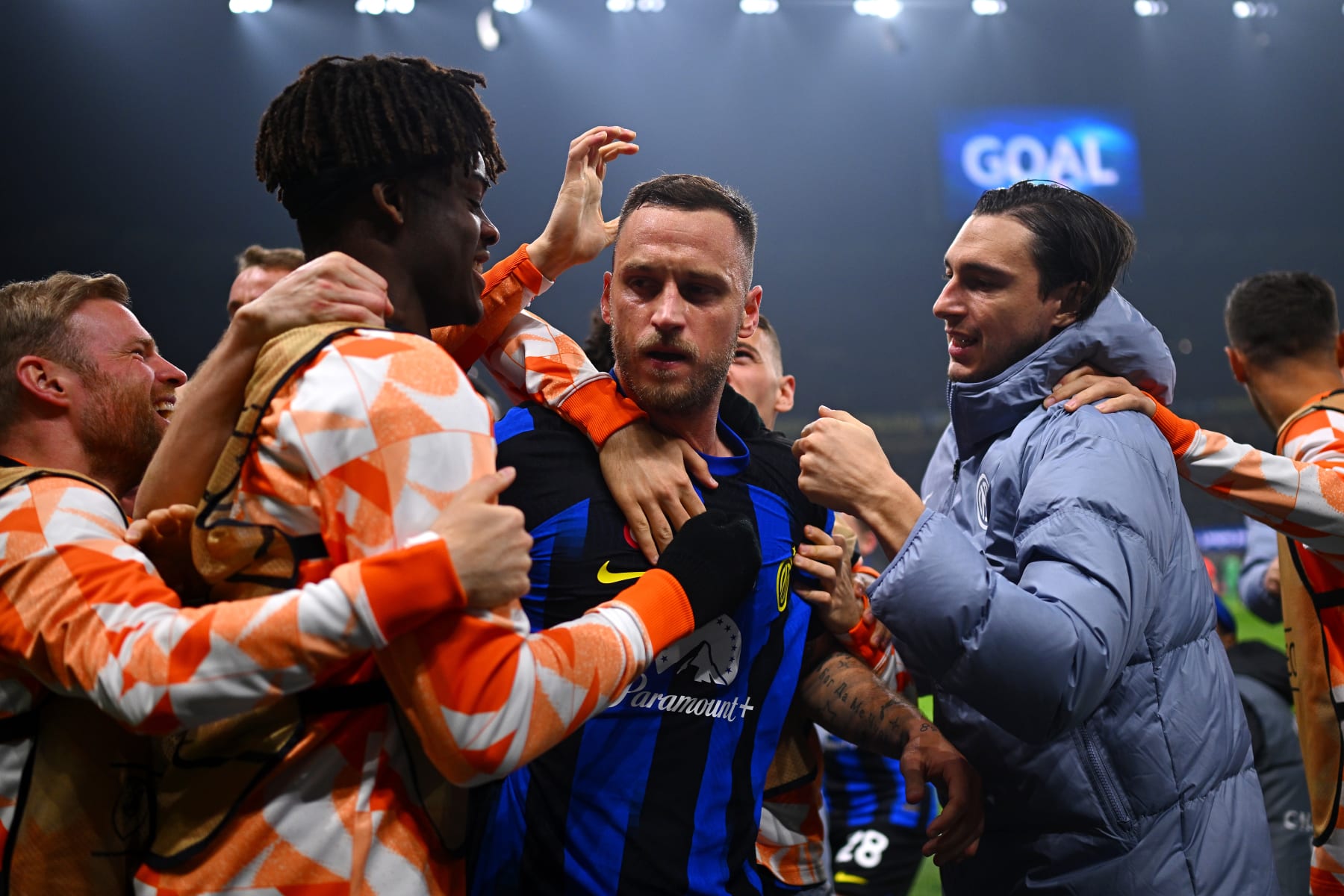 MILAN, ITALY - FEBRUARY 20: Marko Arnautovic of FC Internazionale celebrates with teammates after scoring their team's first goal during the UEFA Champions League 2023/24 round of 16 first leg match between FC Internazionale and Atletico Madrid at Stadio Giuseppe Meazza on February 20, 2024 in Milan, Italy. (Photo by Mattia Ozbot - Inter/Inter via Getty Images)