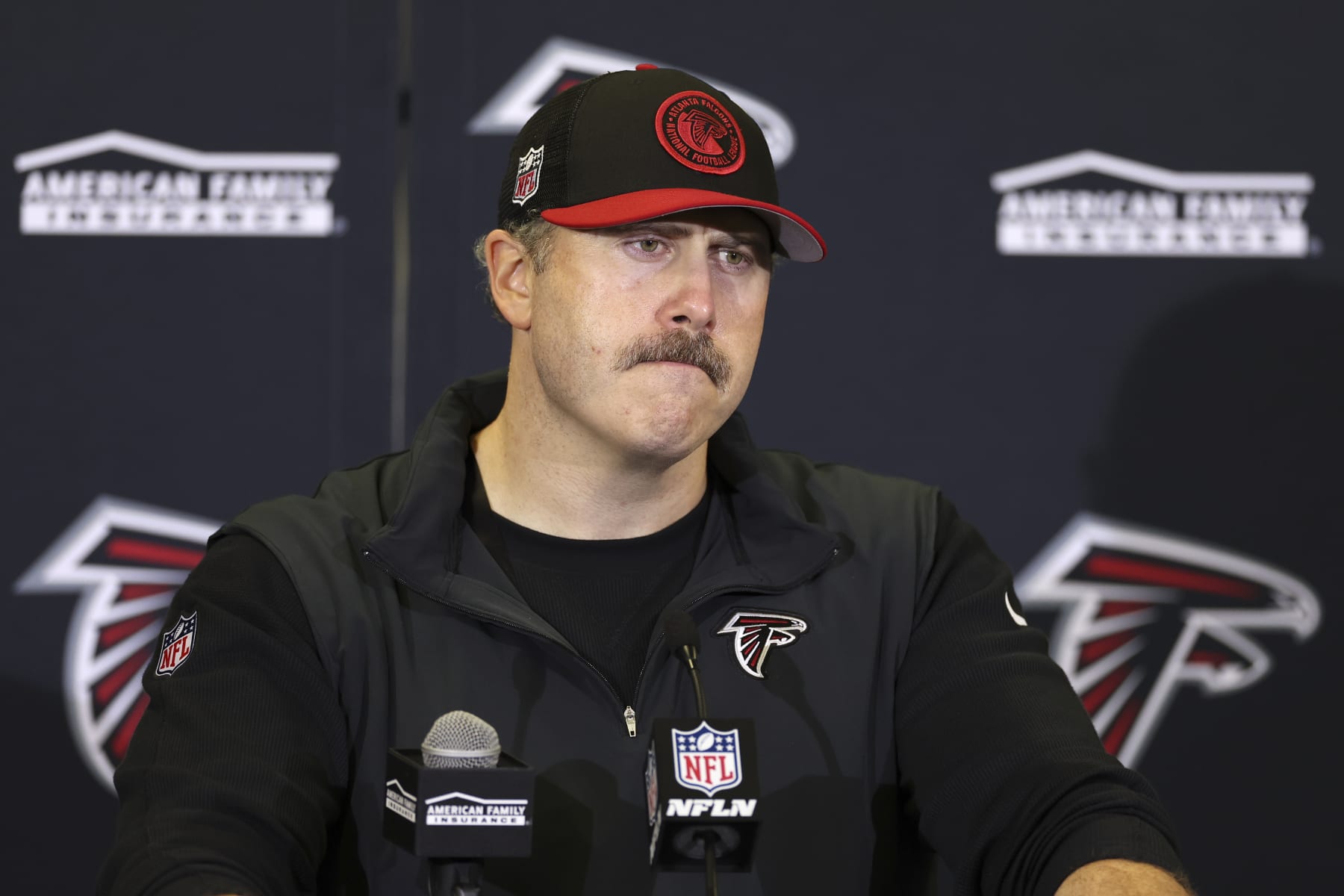 Atlanta Falcons head coach Arthur Smith pauses during a press conference at the end of an NFL football game between the Atlanta Falcons and the Jacksonville Jaguars at Wembley stadium in London, Sunday, Oct. 1, 2023. Jacksonville Jaguars won the game 23-7. (AP Photo/Ian Walton)