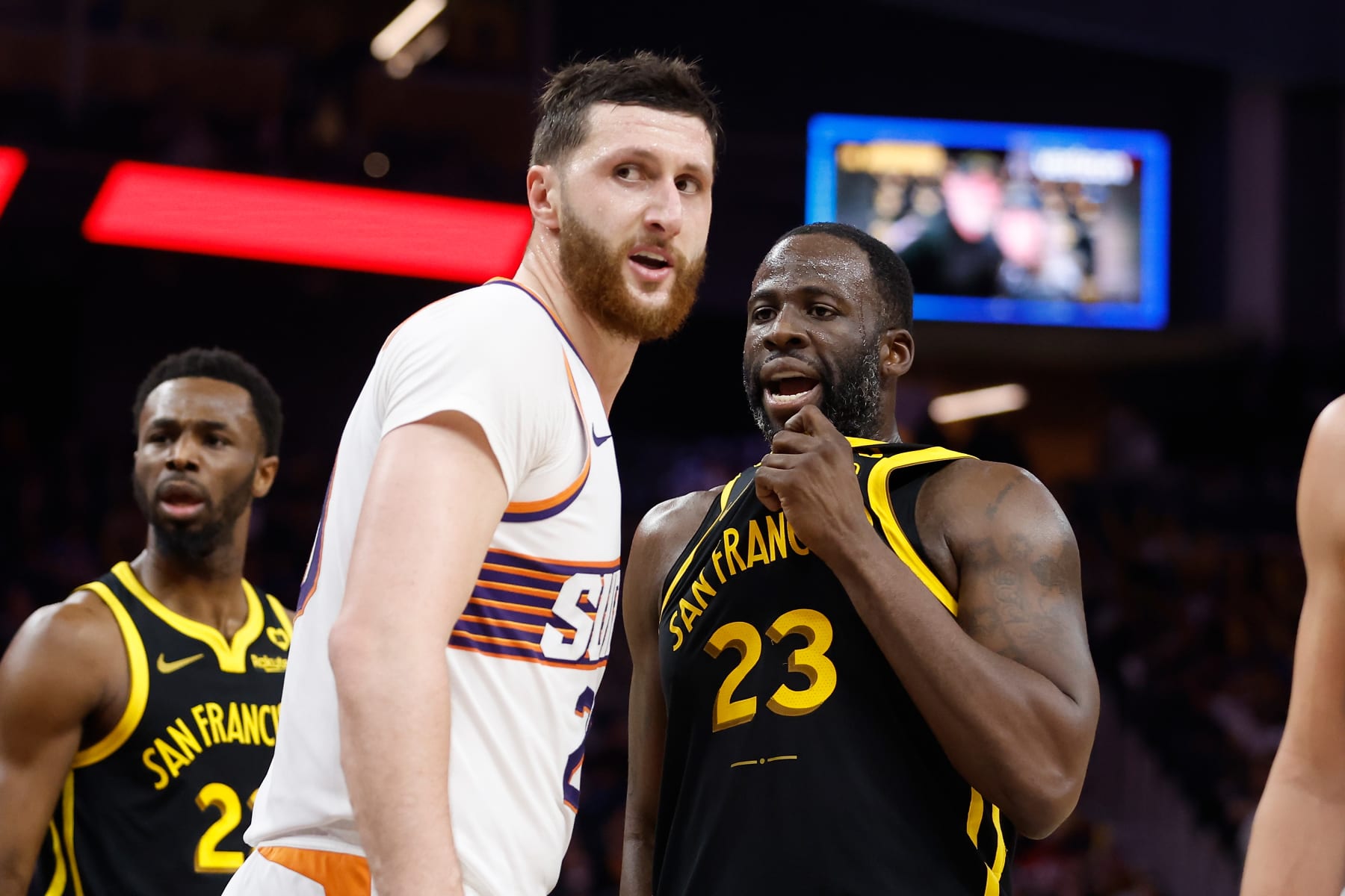 SAN FRANCISCO, CALIFORNIA - FEBRUARY 10: Draymond Green #23 of the Golden State Warriors competes against Jusuf Nurkic #20 of the Phoenix Suns in the third quarter at Chase Center on February 10, 2024 in San Francisco, California. NOTE TO USER: User expressly acknowledges and agrees that, by downloading and or using this photograph, User is consenting to the terms and conditions of the Getty Images License Agreement. (Photo by Lachlan Cunningham/Getty Images)