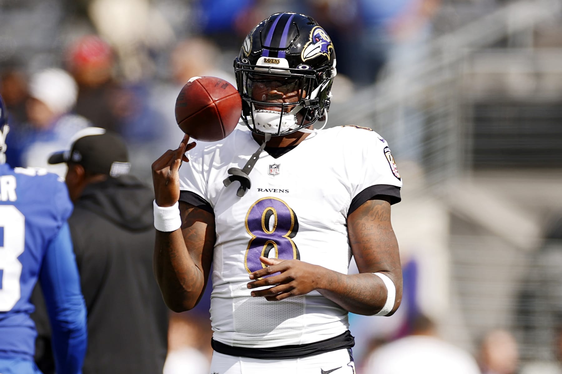 EAST RUTHERFORD, NEW JERSEY - OCTOBER 16: Lamar Jackson #8 of the Baltimore Ravens warms up prior to the game against the New York Giants at MetLife Stadium on October 16, 2022 in East Rutherford, New Jersey. (Photo by Sarah Stier/Getty Images)