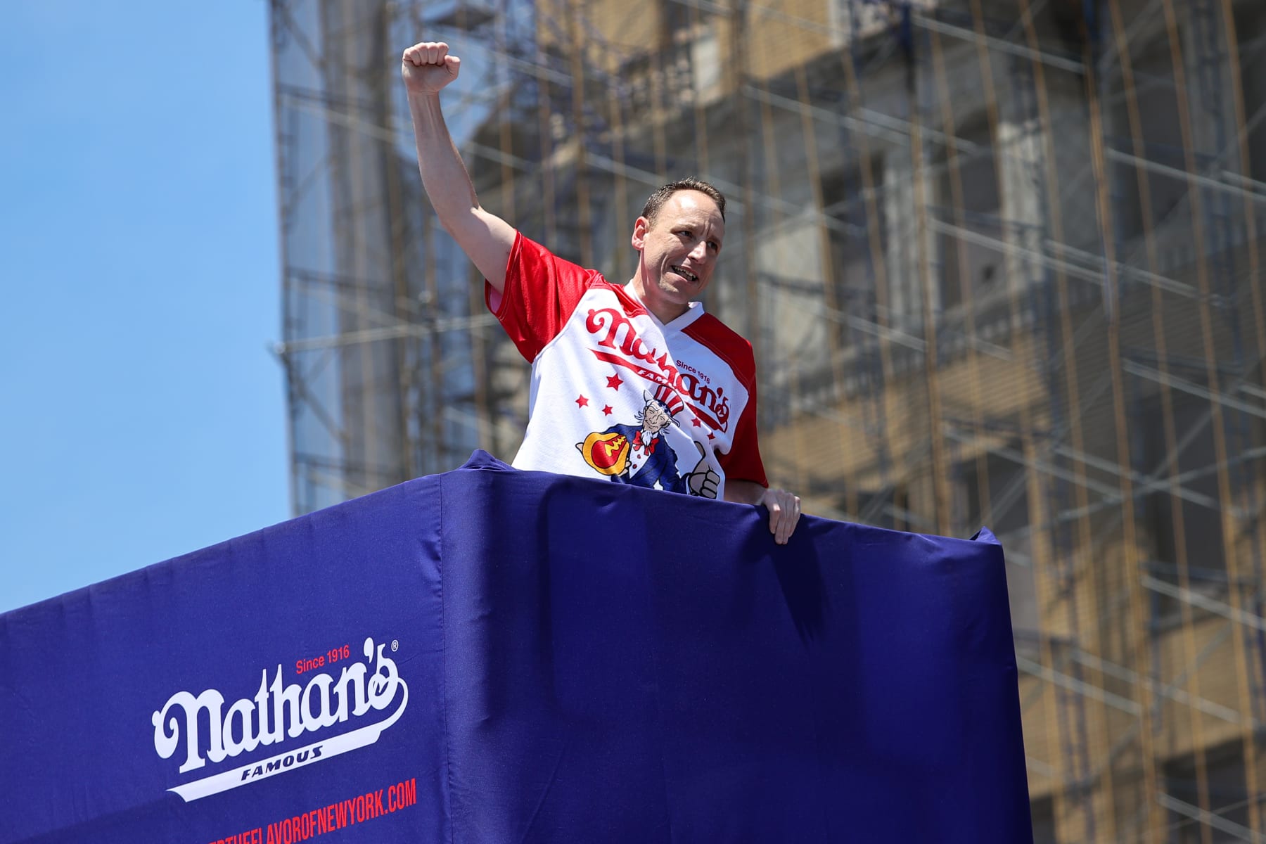 NEW YORK, USA - JULY 04: Joey Chestnut won first place eating 63 hot dogs in 10 minutes during the men 2022 Nathan's Famous International Hot Dog Eating Contest in Coney Island of the Brooklyn borough in New York City, United States on July 4, 2022. (Photo by Tayfun Coskun/Anadolu Agency via Getty Images)