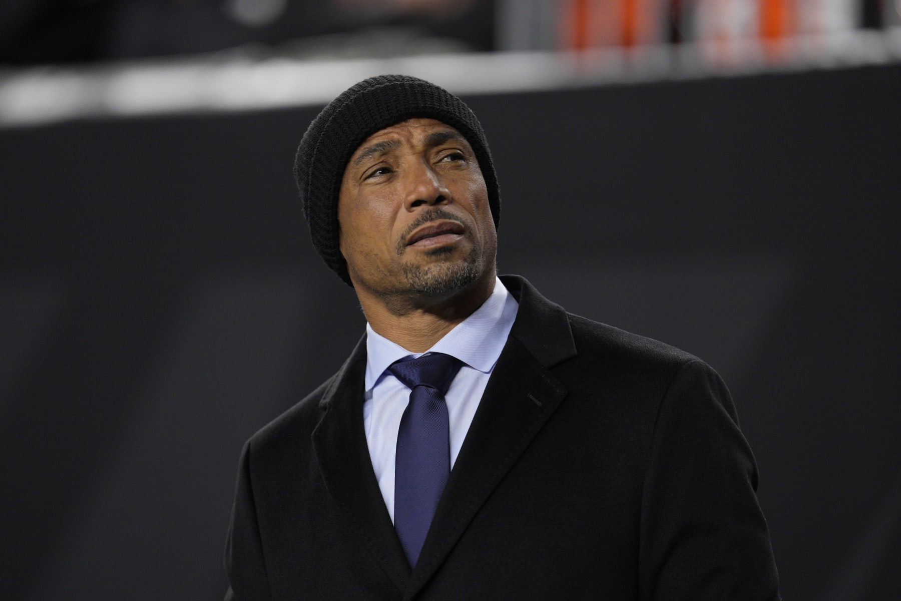 CINCINNATI, OHIO - NOVEMBER 05: Commentator Rodney Harrison stands on the sidelines during a NFL football game between the Buffalo Bills and Cincinnati Bengals at Paycor Stadium on November 05, 2023 in Cincinnati, Ohio. (Photo by Jeff Dean/Getty Images)