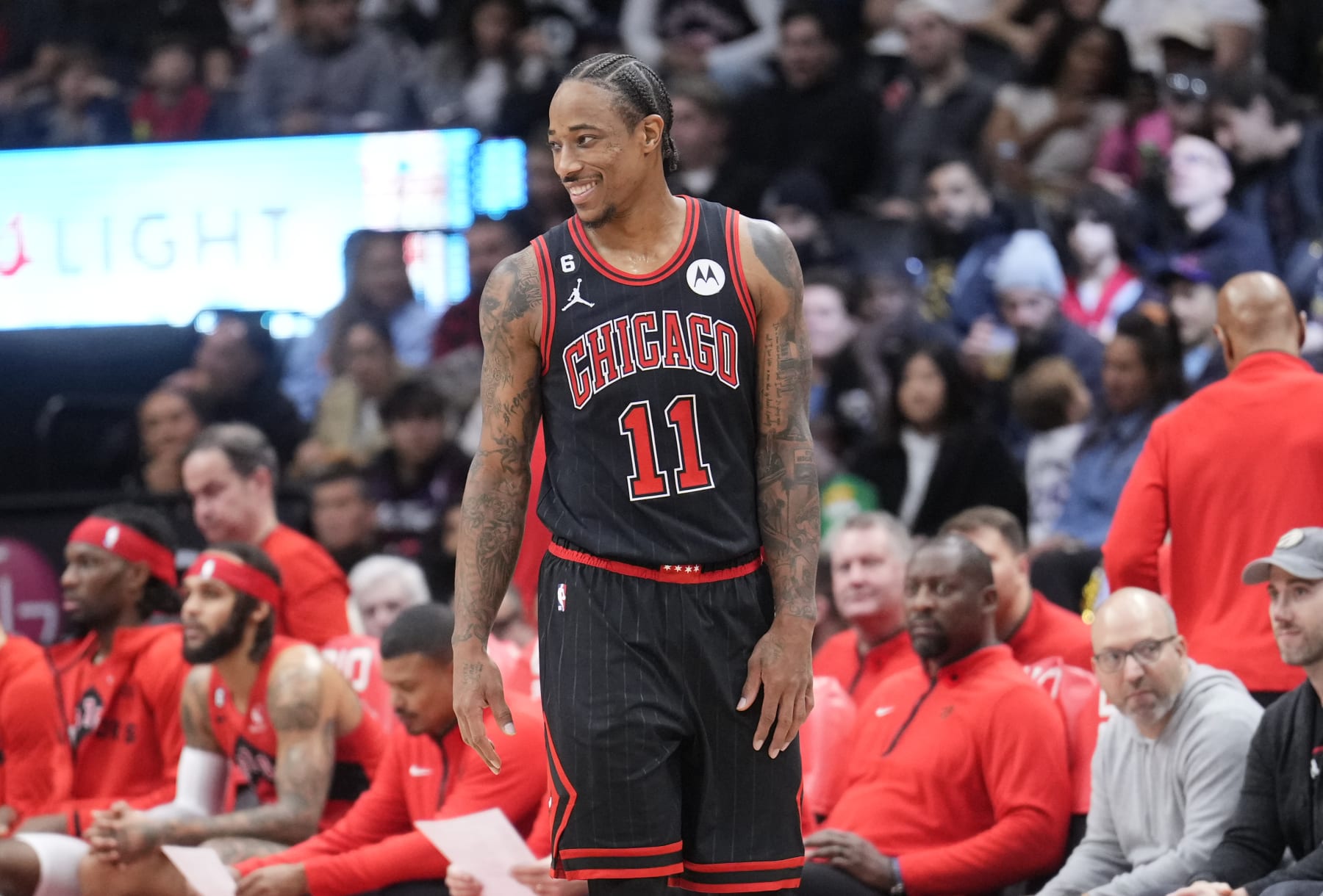 TORONTO, ON - NOVEMBER 6: DeMar DeRozan #11 of the Chicago Bulls smiles against the Toronto Raptors during the first half of their basketball game at the Scotiabank Arena on November 6, 2022 in Toronto, Ontario, Canada. NOTE TO USER: User expressly acknowledges and agrees that, by downloading and/or using this Photograph, user is consenting to the terms and conditions of the Getty Images License Agreement. (Photo by Mark Blinch/Getty Images)