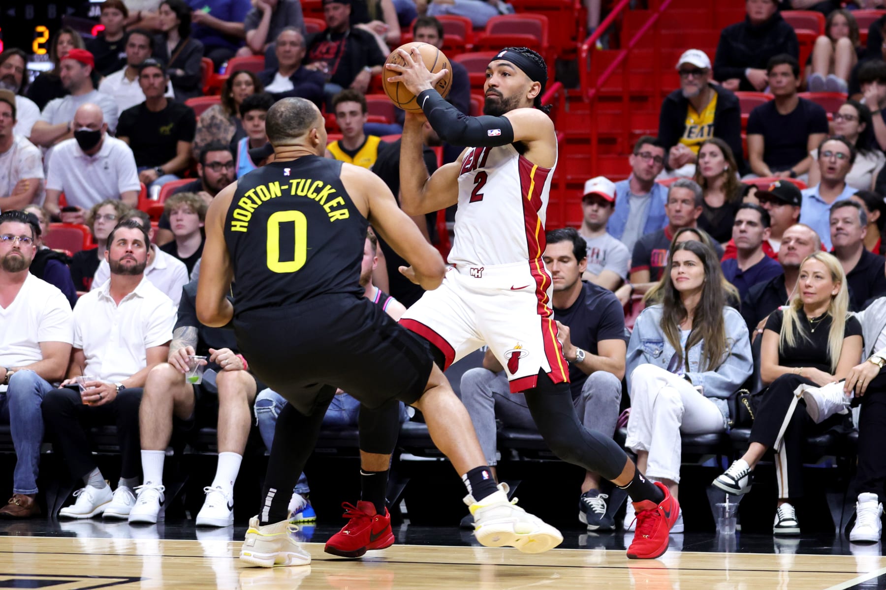 MIAMI, FLORIDA - MARCH 13: Gabe Vincent #2 of the Miami Heat drives against Talen Horton-Tucker #0 of the Utah Jazz during the second quarter of the game at Miami-Dade Arena on March 13, 2023 in Miami, Florida. NOTE TO USER: User expressly acknowledges and agrees that, by downloading and or using this photograph, User is consenting to the terms and conditions of the Getty Images License Agreement. (Photo by Megan Briggs/Getty Images)