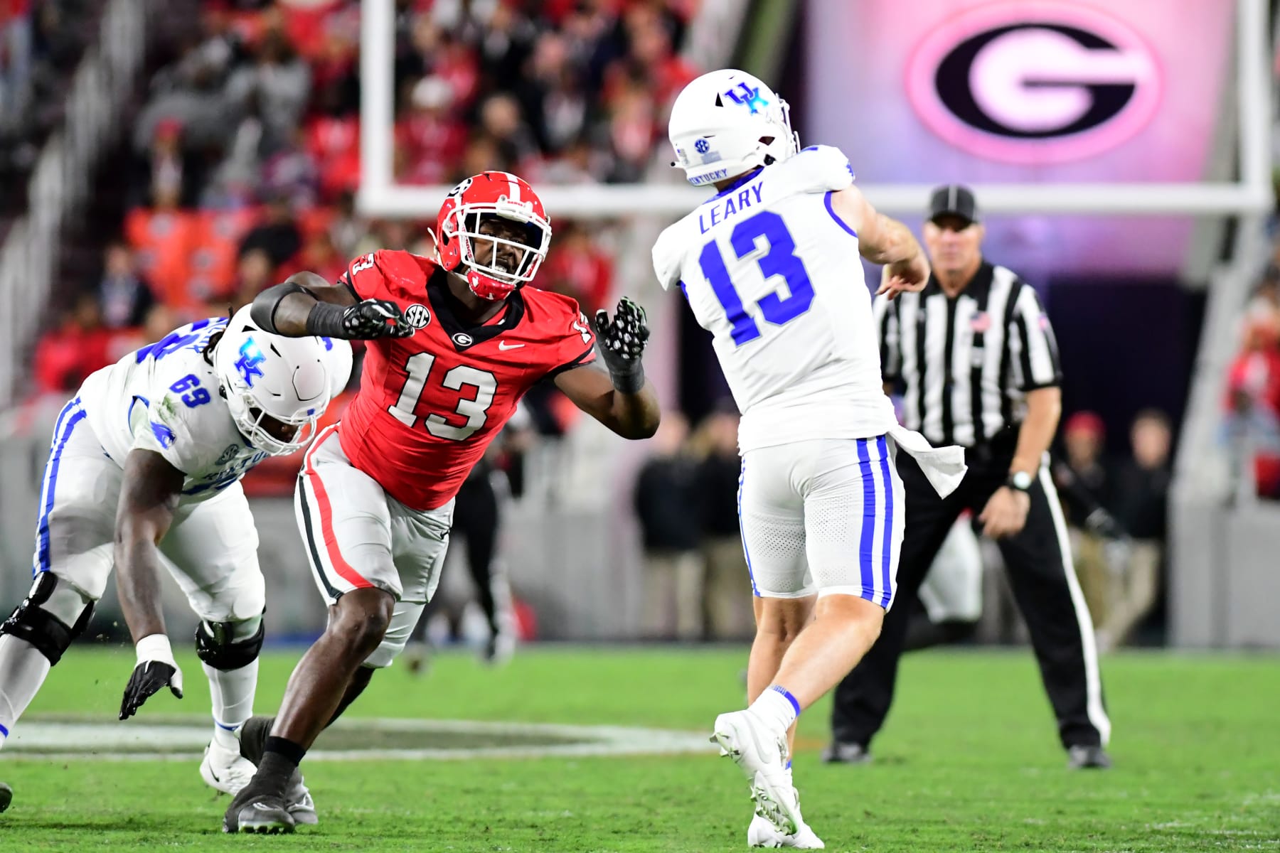 ATHENS, GA - OCTOBER 7: Bulldog defender Mykel Williams #13 rushes Wildcat quarterback Devin Leary #13 during a game between University of Kentucky and University of Georgia at Sanford Stadium on October 7, 2023 in Athens, Georgia. (Photo by Perry McIntyre/ISI Photos/Getty Images)