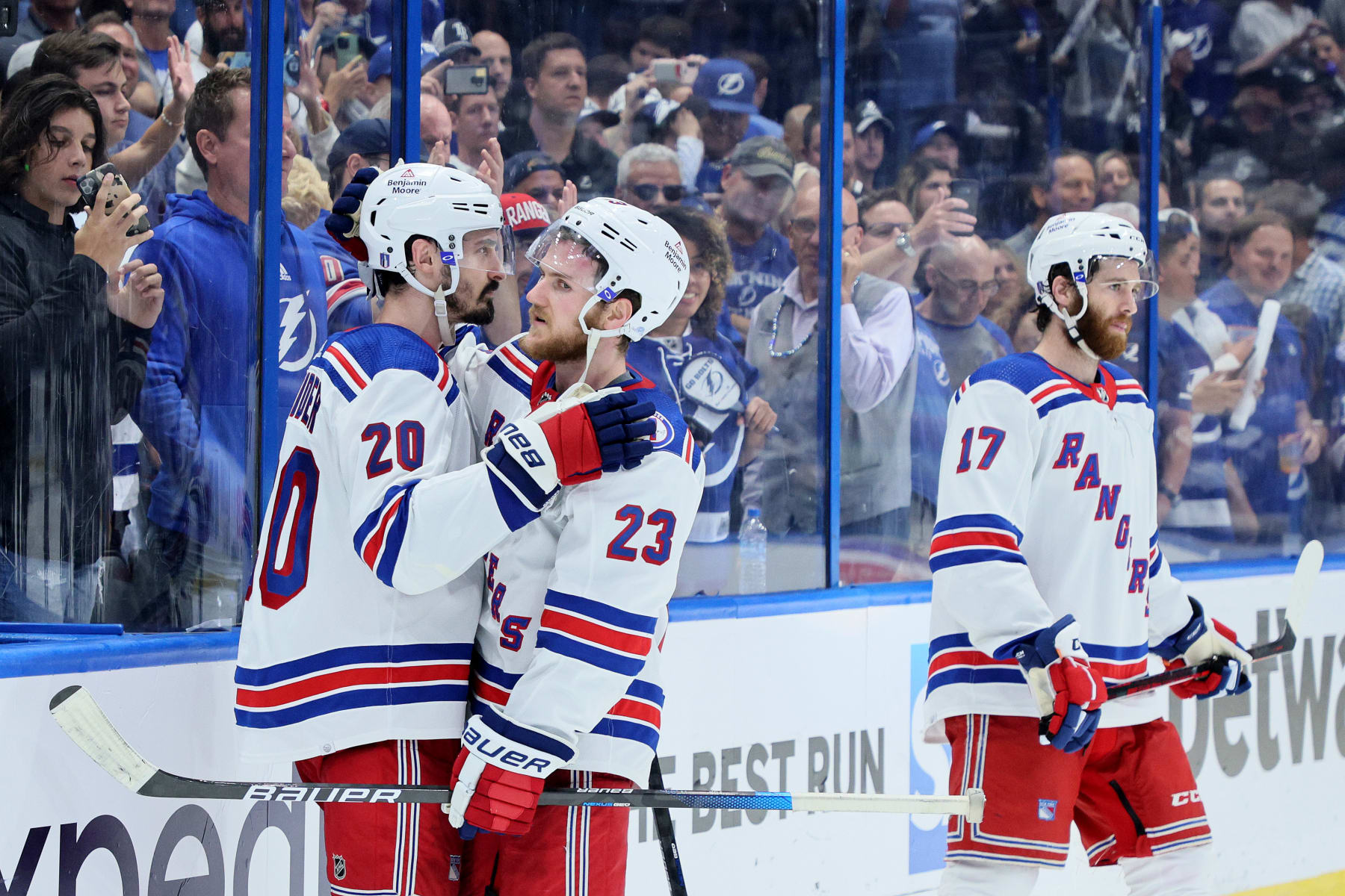 TAMPA, FLORIDA - JUNE 11: Chris Kreider #20 and Adam Fox #23 of the New York Rangers hug after being defeated by the Tampa Bay Lightning in Game Six of the Eastern Conference Final of the 2022 Stanley Cup Playoffs at Amalie Arena on June 11, 2022 in Tampa, Florida. (Photo by Andy Lyons/Getty Images)