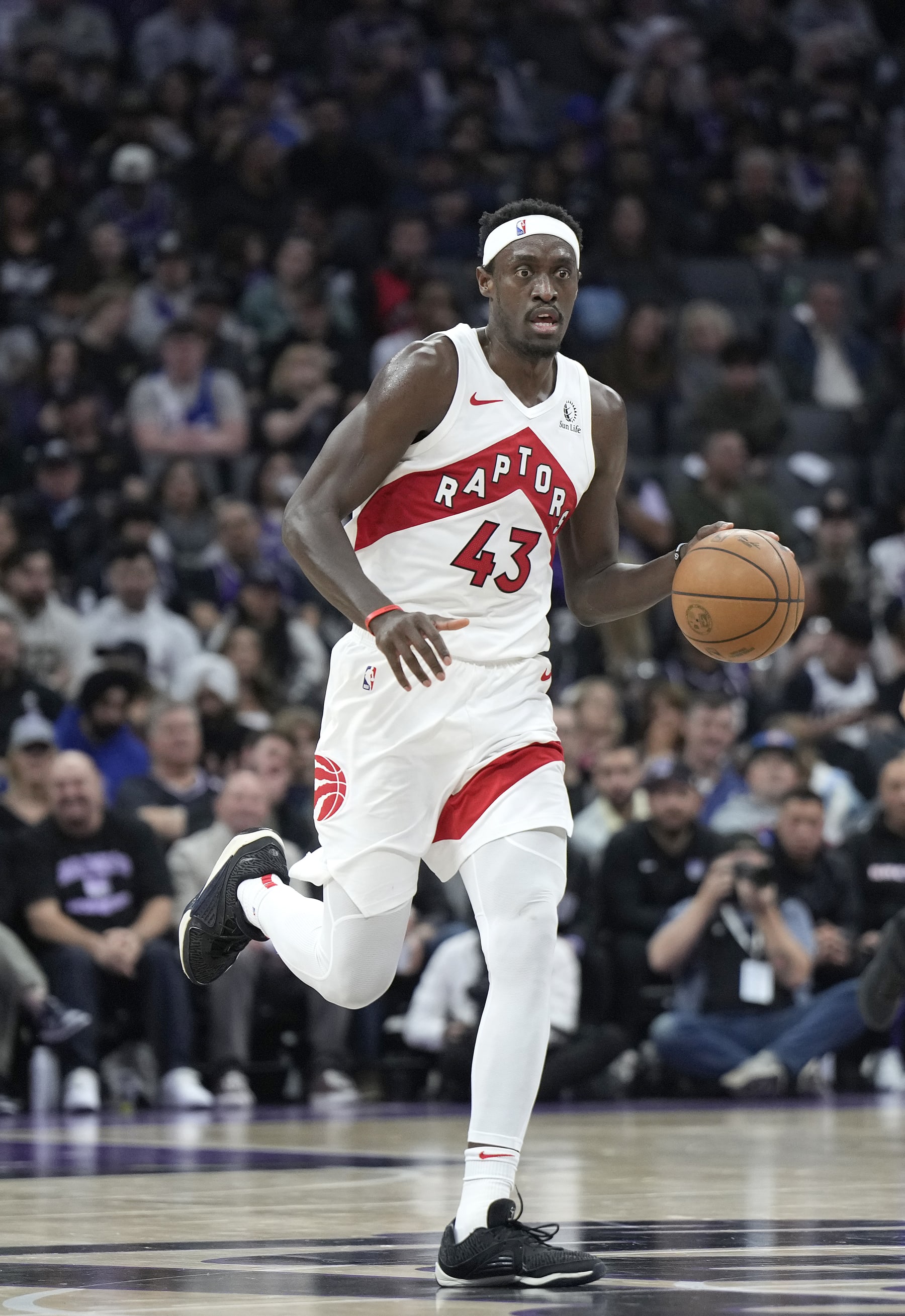 SACRAMENTO, CALIFORNIA - JANUARY 05: Pascal Siakam #43 of the Toronto Raptors dribbles the ball up court against the Sacramento Kings during the first half of an NBA basketball game at Golden 1 Center on January 05, 2024 in Sacramento, California. NOTE TO USER: User expressly acknowledges and agrees that, by downloading and or using this photograph, User is consenting to the terms and conditions of the Getty Images License Agreement. (Photo by Thearon W. Henderson/Getty Images)