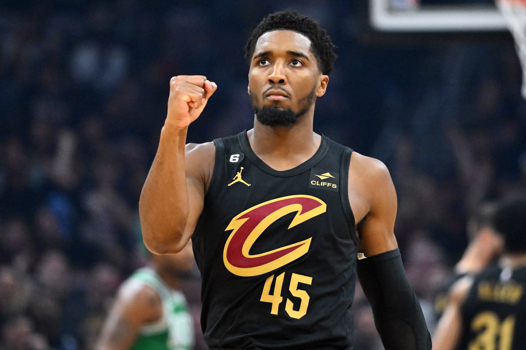 CLEVELAND, OHIO - NOVEMBER 02: Donovan Mitchell #45 of the Cleveland Cavaliers celebrates after the Cleveland Cavaliers scored during the first quarter against the Boston Celtics at Rocket Mortgage Fieldhouse on November 02, 2022 in Cleveland, Ohio. NOTE TO USER: User expressly acknowledges and agrees that, by downloading and or using this photograph, User is consenting to the terms and conditions of the Getty Images License Agreement. (Photo by Jason Miller/Getty Images)