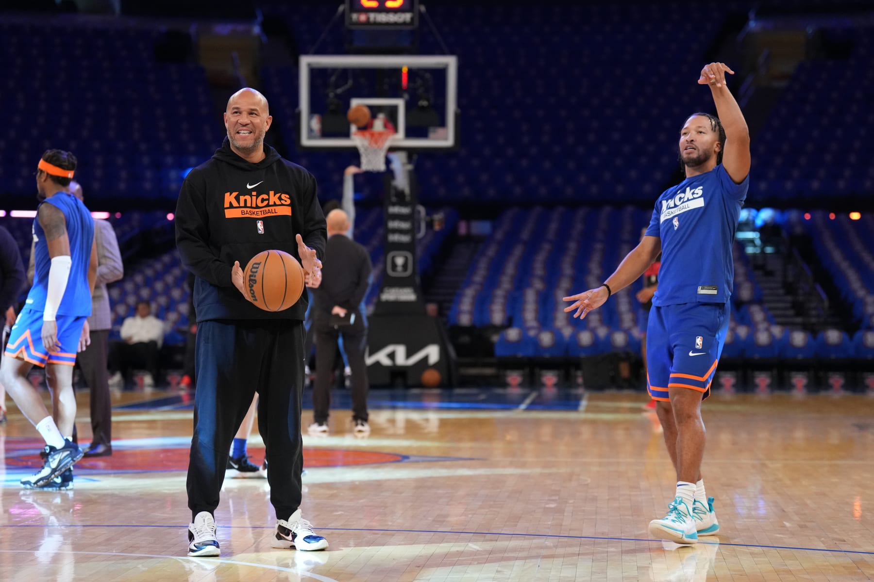 Rick Brunson (L), Jalen Brunson (R)