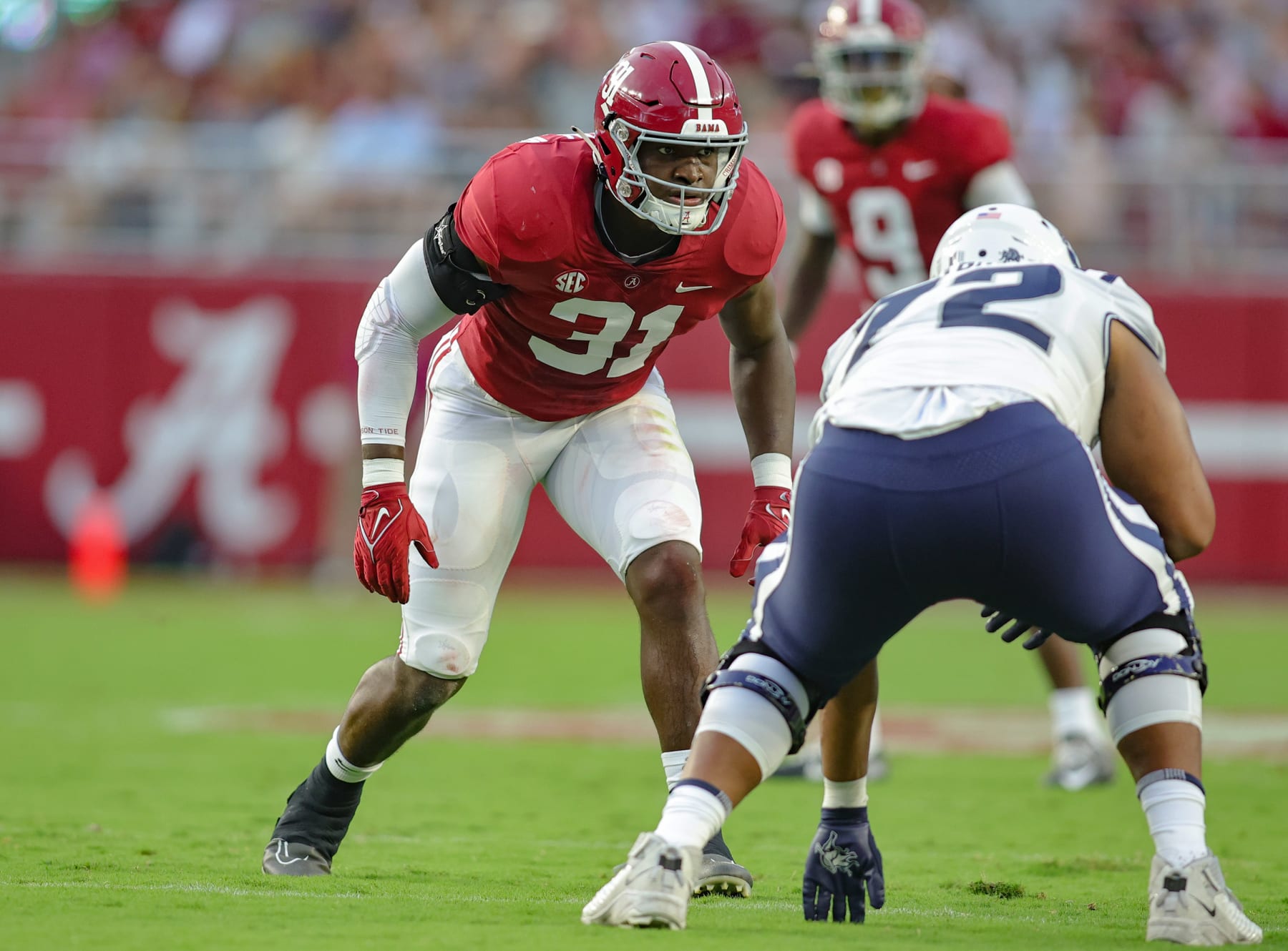 TUSCALOOSA, ALABAMA - SEPTEMBER 3: Will Anderson Jr. #31 of the Alabama Crimson Tide stares into the backfield opposite Alfred Edwards #72 of the Utah State Aggies at Bryant Denny Stadium on September 3, 2022 in Tuscaloosa, Alabama. (Photo by Brandon Sumrall/Getty Images)