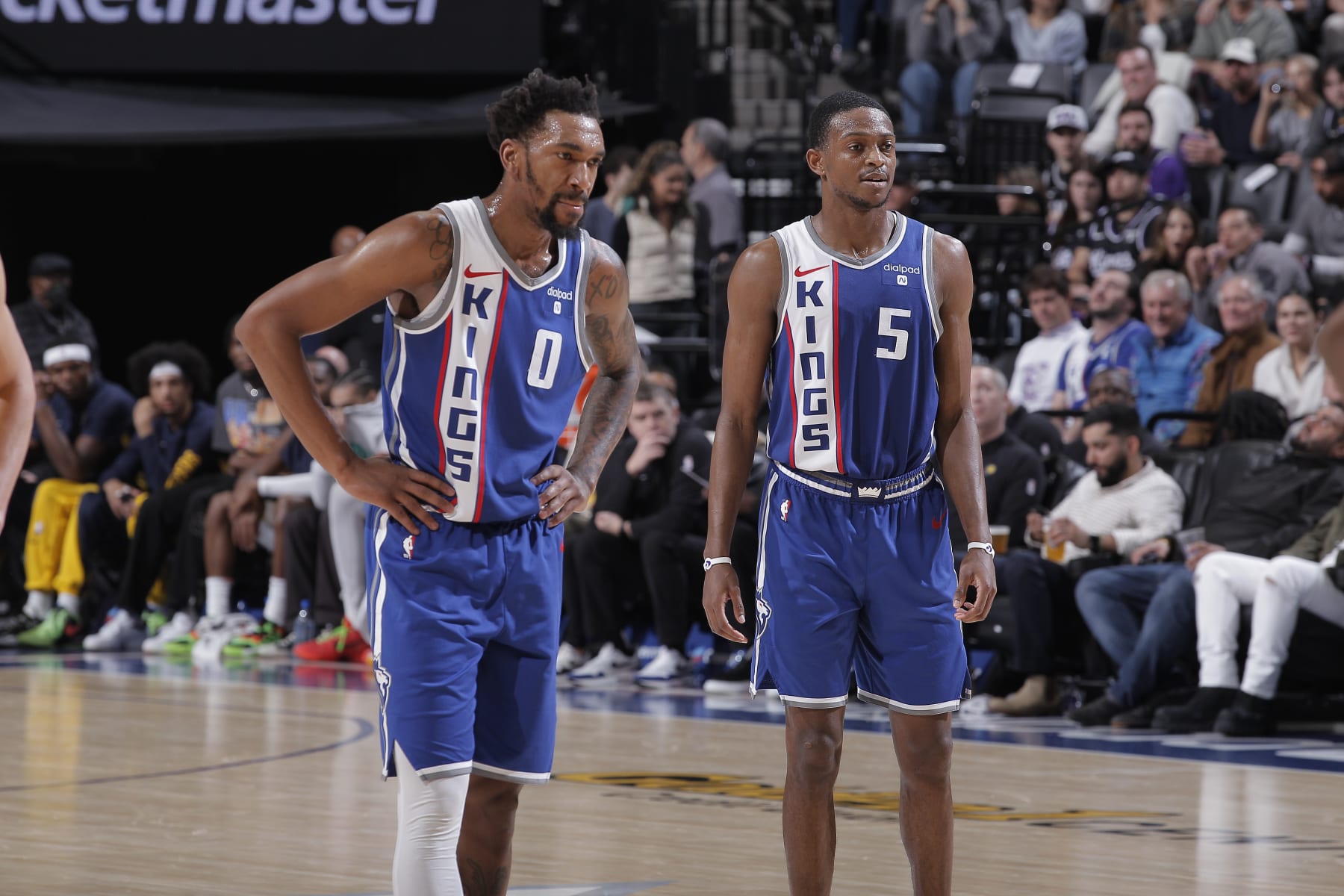 SACRAMENTO, CA - JANUARY 18: Malik Monk #0 and De'Aaron Fox #5 of the Sacramento Kings look on during the game against the Indiana Pacers on January 18, 2024 at Golden 1 Center in Sacramento, California. NOTE TO USER: User expressly acknowledges and agrees that, by downloading and or using this photograph, User is consenting to the terms and conditions of the Getty Images Agreement. Mandatory Copyright Notice: Copyright 2024 NBAE (Photo by Rocky Widner/NBAE via Getty Images)