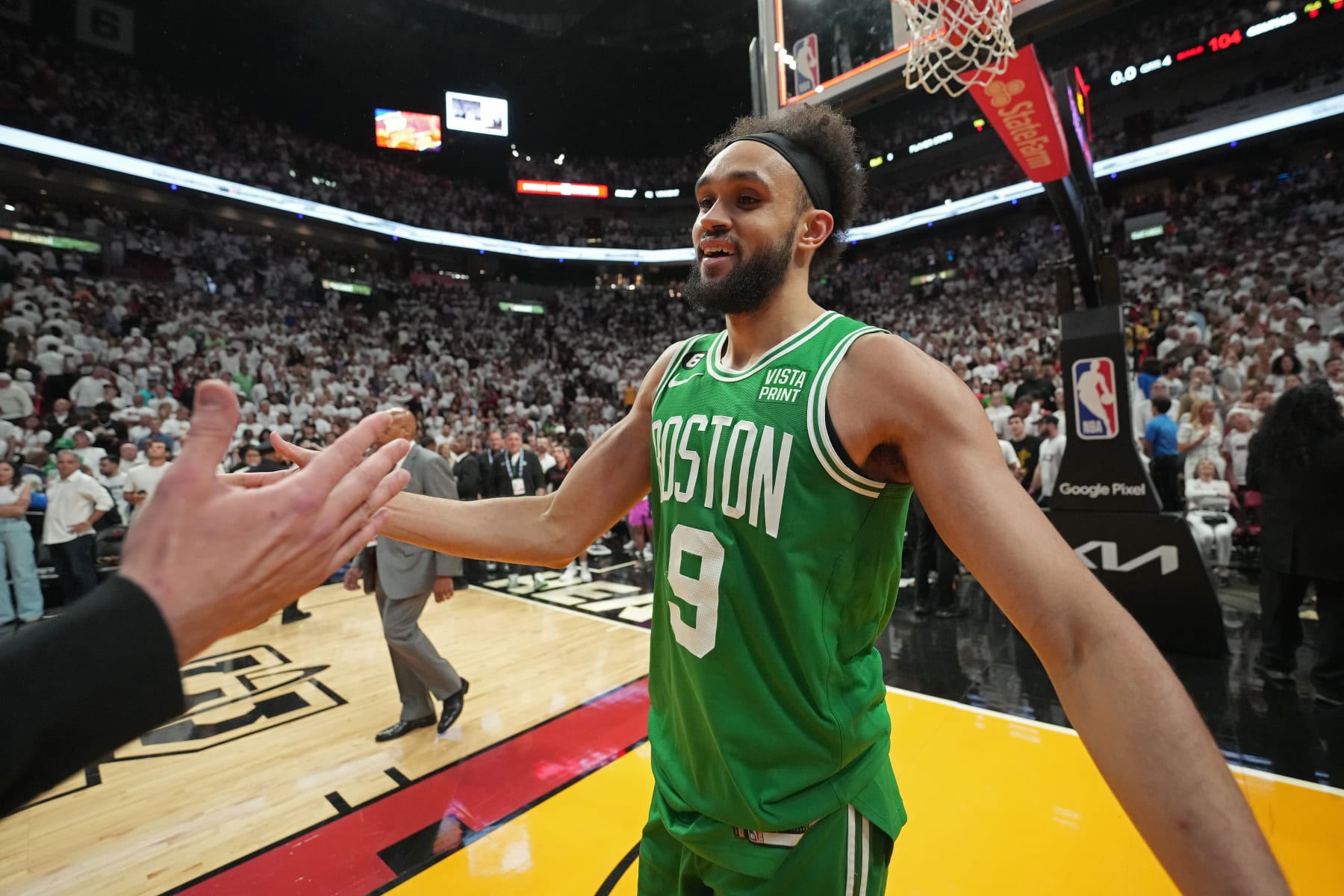 MIAMI, FL - MAY 27: Derrick White #9 of the Boston Celtics reacts after hitting a game winner during round 3 game 6 of the Eastern Conference Finals against the Miami Heat on May 27, 2023 at the Kaseya Center in Miami, Florida. NOTE TO USER: User expressly acknowledges and agrees that, by downloading and or using this Photograph, user is consenting to the terms and conditions of the Getty Images License Agreement. Mandatory Copyright Notice: Copyright 2023 NBAE (Photo by Jesse D. Garrabrant/NBAE via Getty Images)