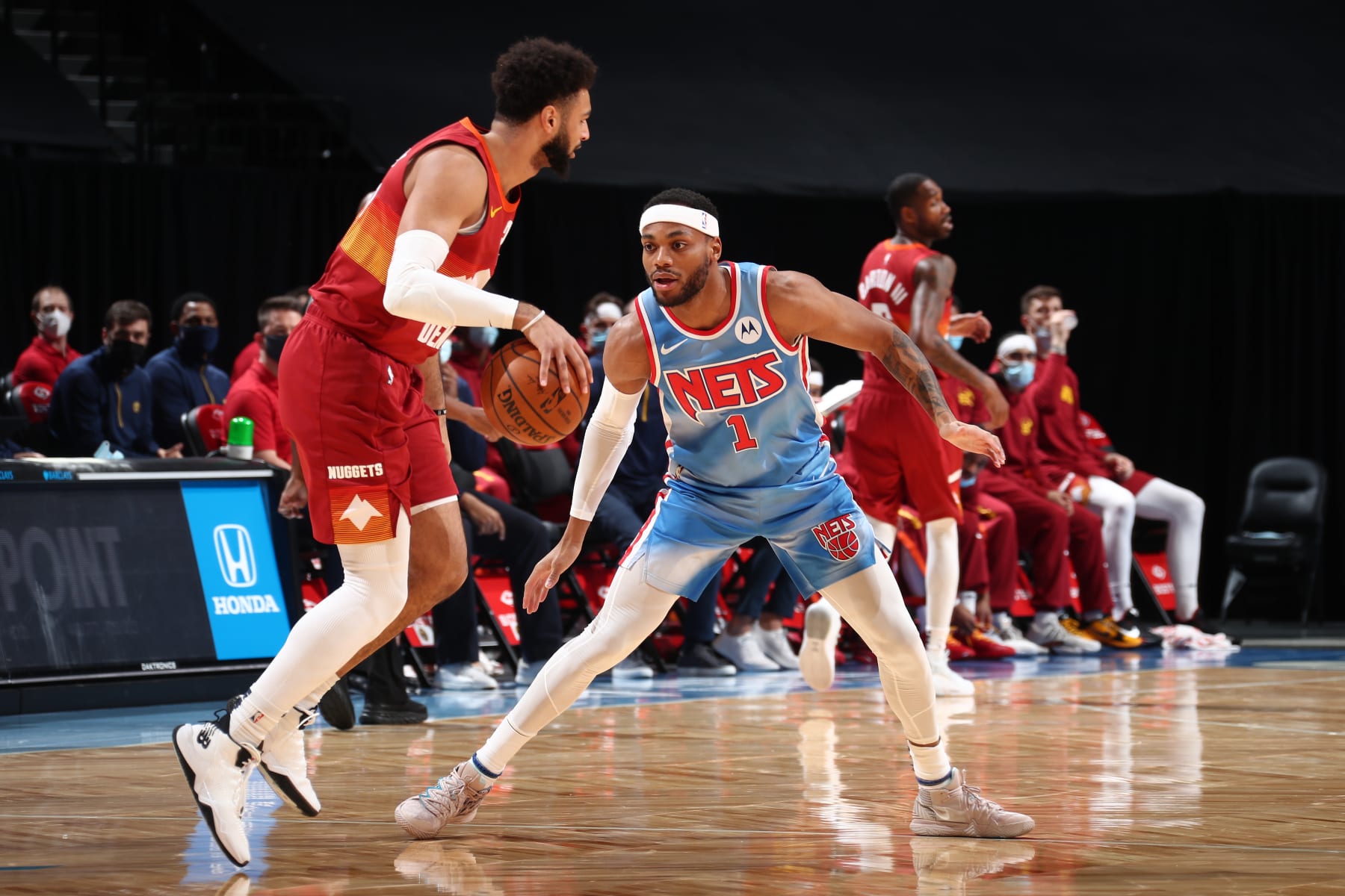 BROOKLYN, NY - JANUARY 12: Bruce Brown #1 of the Brooklyn Nets plays defense during the game against the Denver Nuggets on January 12, 2021 at Barclays Center in Brooklyn, New York. NOTE TO USER: User expressly acknowledges and agrees that, by downloading and or using this Photograph, user is consenting to the terms and conditions of the Getty Images License Agreement. Mandatory Copyright Notice: Copyright 2021 NBAE (Photo by Nathaniel S. Butler/NBAE via Getty Images)