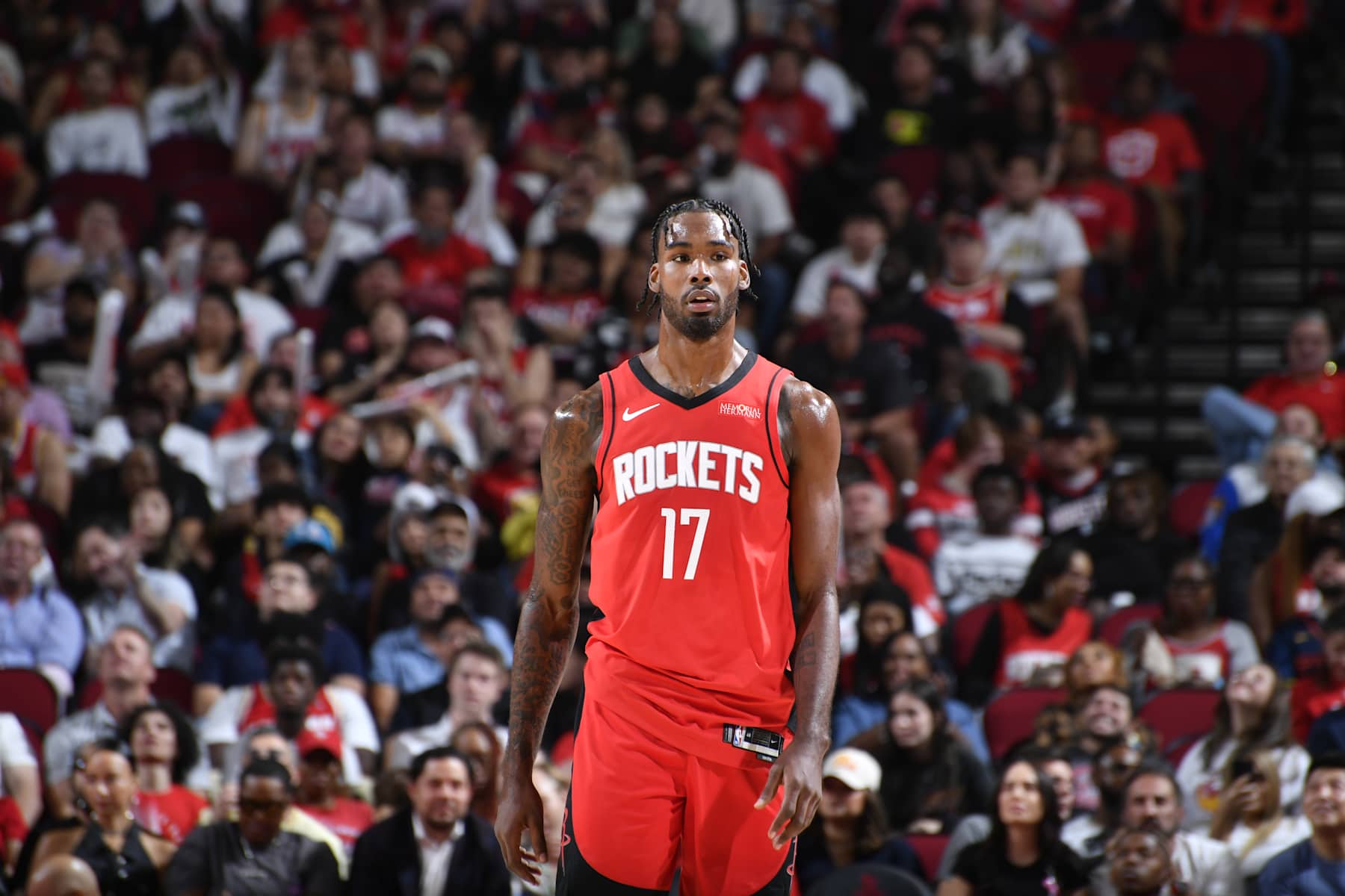 HOUSTON, TX - OCTOBER 23:  Tari Eason #17 of the Houston Rockets looks on during the game against the Charlotte Hornets during a regular season game on October 23, 2024 at the Toyota Center in Houston, Texas. NOTE TO USER: User expressly acknowledges and agrees that, by downloading and or using this photograph, User is consenting to the terms and conditions of the Getty Images License Agreement. Mandatory Copyright Notice: Copyright 2024 NBAE (Photo by Logan Riely/NBAE via Getty Images)