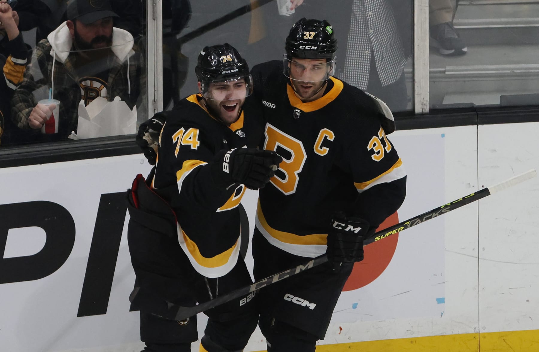 Boston, MA - February 20: Boston Bruins LW Jake DeBrusk points and smiles after scoring a goal in the first period. The Bruins beat the Ottawa Senators, 3-1. (Photo by Jessica Rinaldi/The Boston Globe via Getty Images)