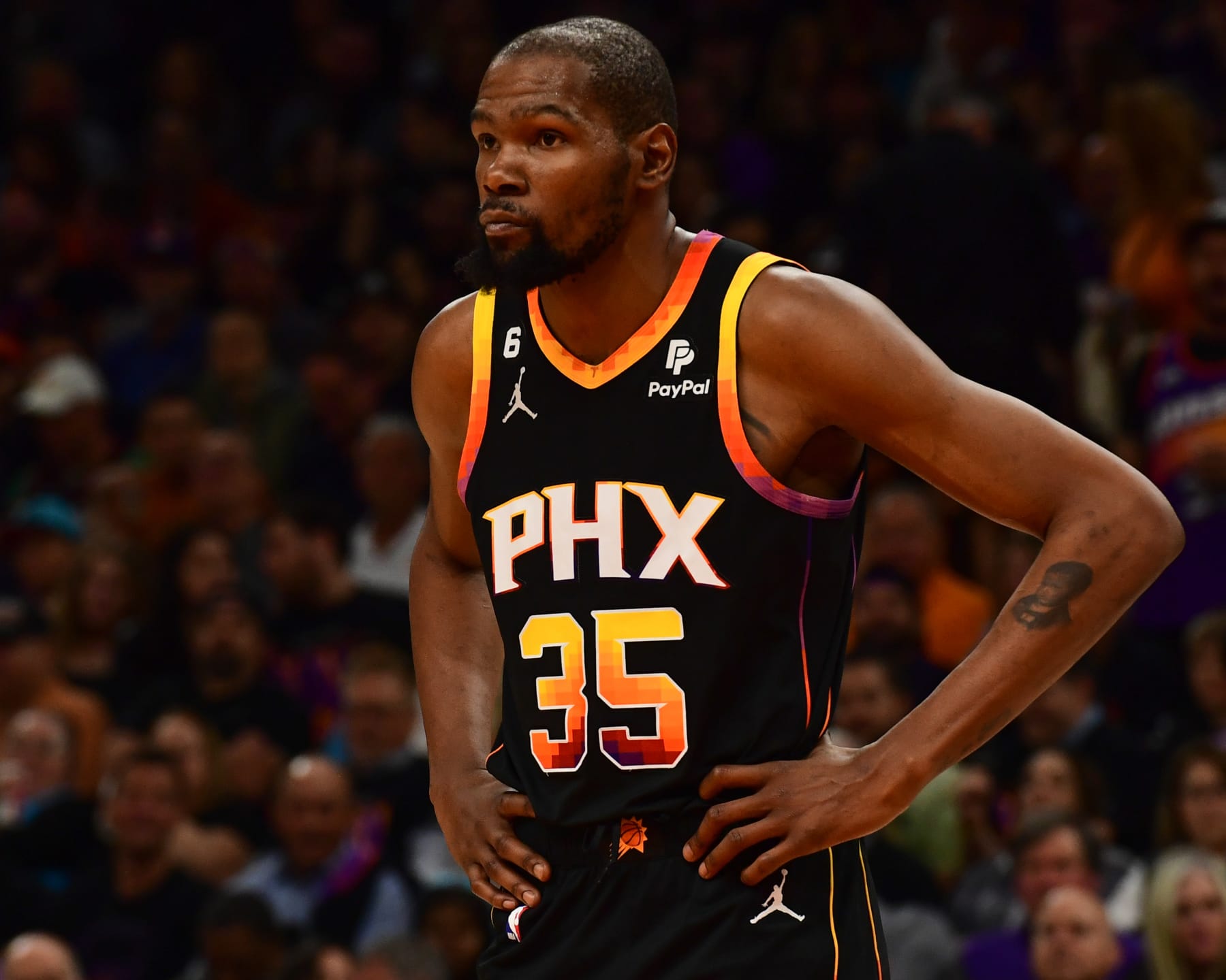 PHOENIX, AZ - APRIL 18:  Kevin Durant #35 of the Phoenix Suns looks on during the game during round one game two of the 2023 NBA Playoffs on April 18, 2023 at Footprint Center in Phoenix, Arizona. NOTE TO USER: User expressly acknowledges and agrees that, by downloading and or using this photograph, user is consenting to the terms and conditions of the Getty Images License Agreement. Mandatory Copyright Notice: Copyright 2023 NBAE (Photo by Kate Frese/NBAE via Getty Images)
