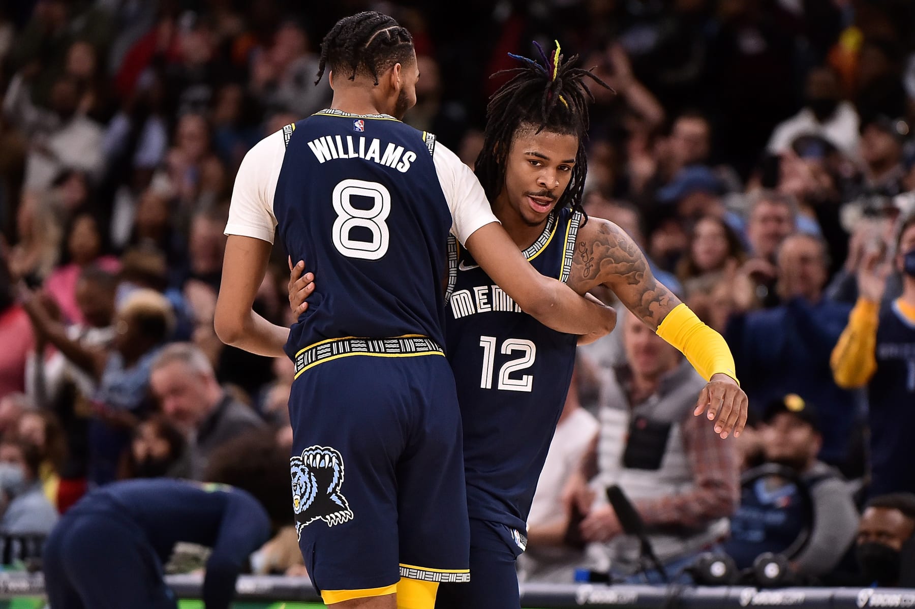 MEMPHIS, TENNESSEE - FEBRUARY 28: Ziaire Williams #8 of the Memphis Grizzlies and Ja Morant #12 of the Memphis Grizzlies embrace during the game against the San Antonio Spurs at FedExForum on February 28, 2022 in Memphis, Tennessee. NOTE TO USER: User expressly acknowledges and agrees that, by downloading and or using this photograph, User is consenting to the terms and conditions of the Getty Images License Agreement. (Photo by Justin Ford/Getty Images)
