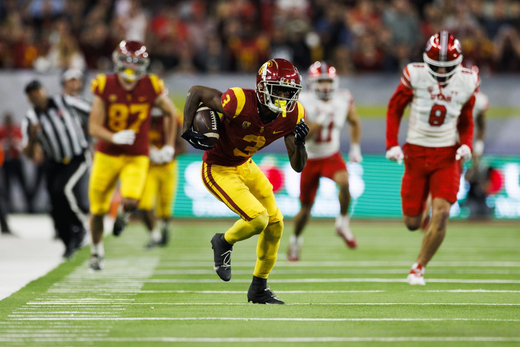 LAS VEGAS, NV - DECEMBER 02: USC Trojans wide receiver Jordan Addison (3) runs after the catch during the Pac-12 Championship football game between Utah Utes and USC Trojans on December 2, 2022 at Allegiant Stadium in Las Vegas, NV. (Photo by Ric Tapia/Icon Sportswire via Getty Images)