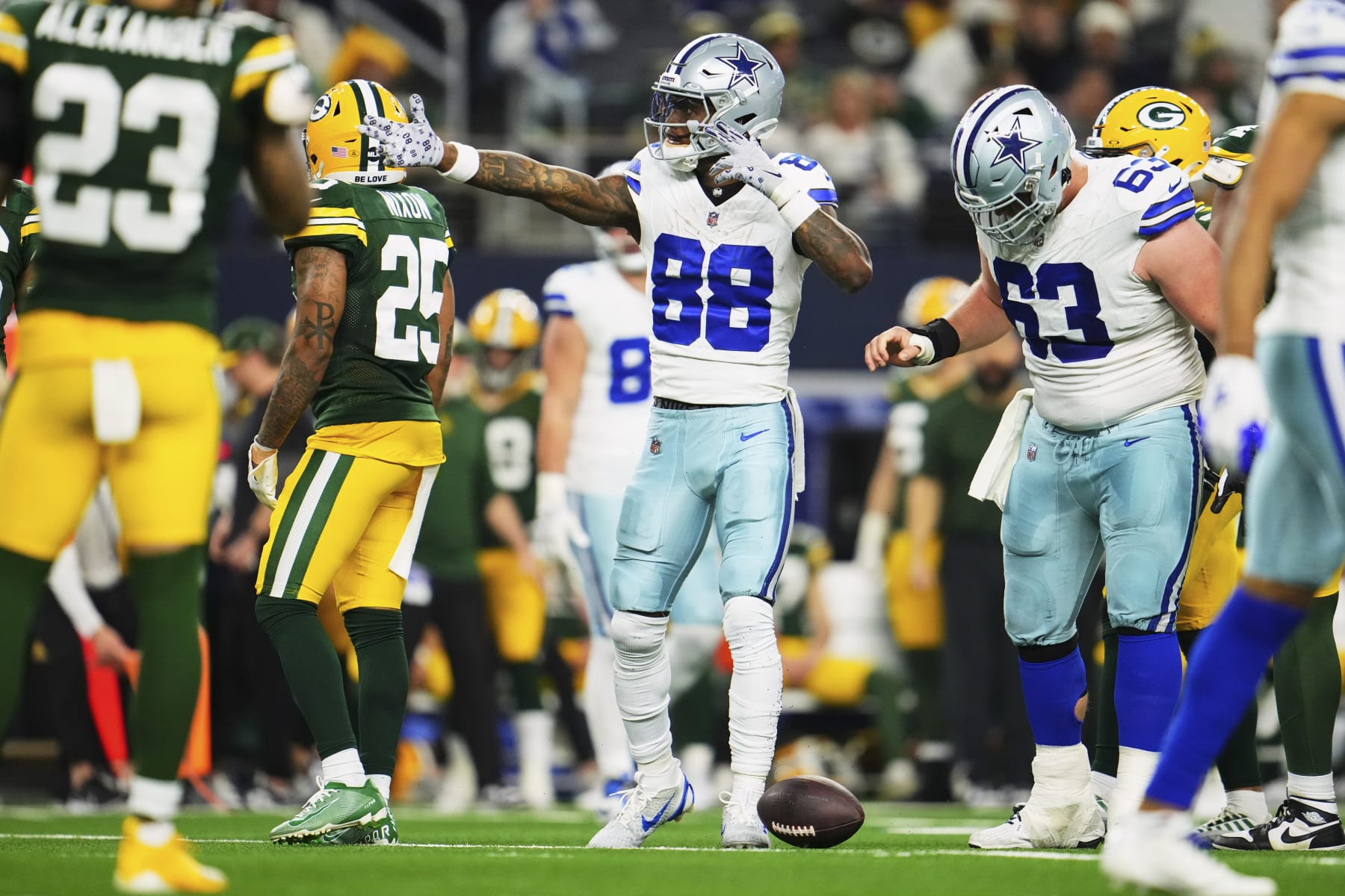 DALLAS, TX - JANUARY 14: CeeDee Lamb #88 of the Dallas Cowboys celebrates after a play against the Green Bay Packers during the second half of the NFC Wild Card playoff game at AT&T Stadium on January 14, 2024 in Dallas, Texas. (Photo by Cooper Neill/Getty Images)