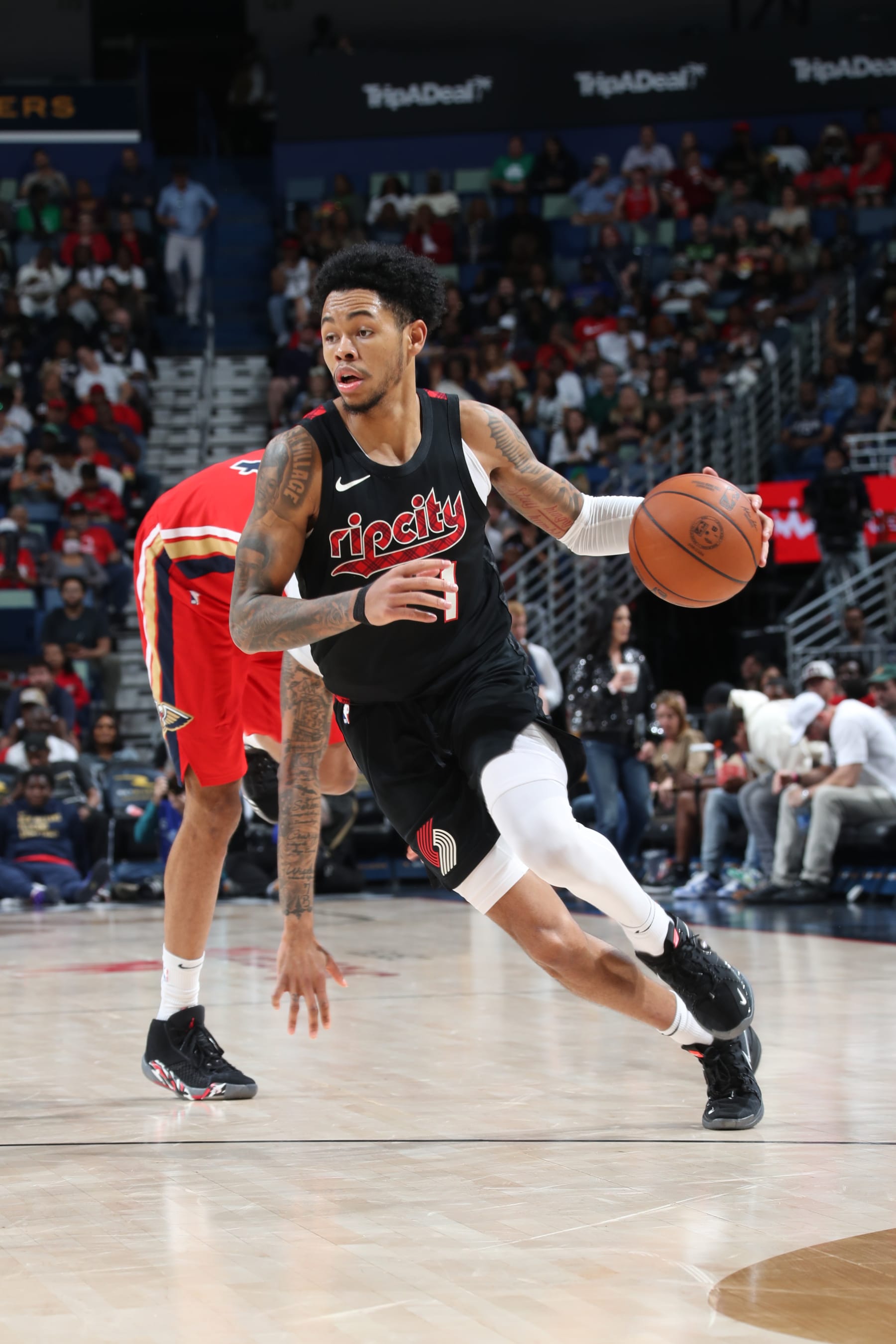 NEW ORLEANS, LA - MARCH 16: Anfernee Simons #1 of the Portland Trail Blazers dribbles the ball during the game against the New Orleans Pelicans on March 16, 2024 at the Smoothie King Center in New Orleans, Louisiana. NOTE TO USER: User expressly acknowledges and agrees that, by downloading and or using this Photograph, user is consenting to the terms and conditions of the Getty Images License Agreement. Mandatory Copyright Notice: Copyright 2024 NBAE (Photo by Layne Murdoch Jr./NBAE via Getty Images)