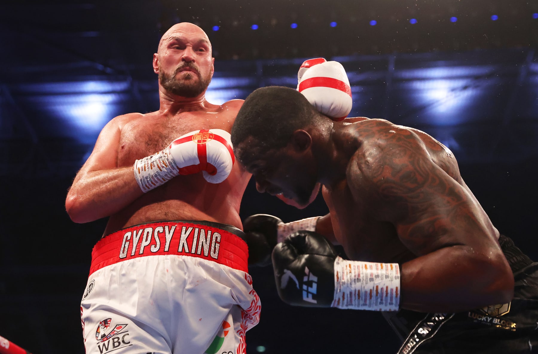 LONDON, ENGLAND - APRIL 23: Tyson Fury punches Dillian Whyte during the WBC World Heavyweight Title Fight between Tyson Fury and Dillian Whyte at Wembley Stadium on April 23, 2022 in London, England. (Photo by Julian Finney/Getty Images)
