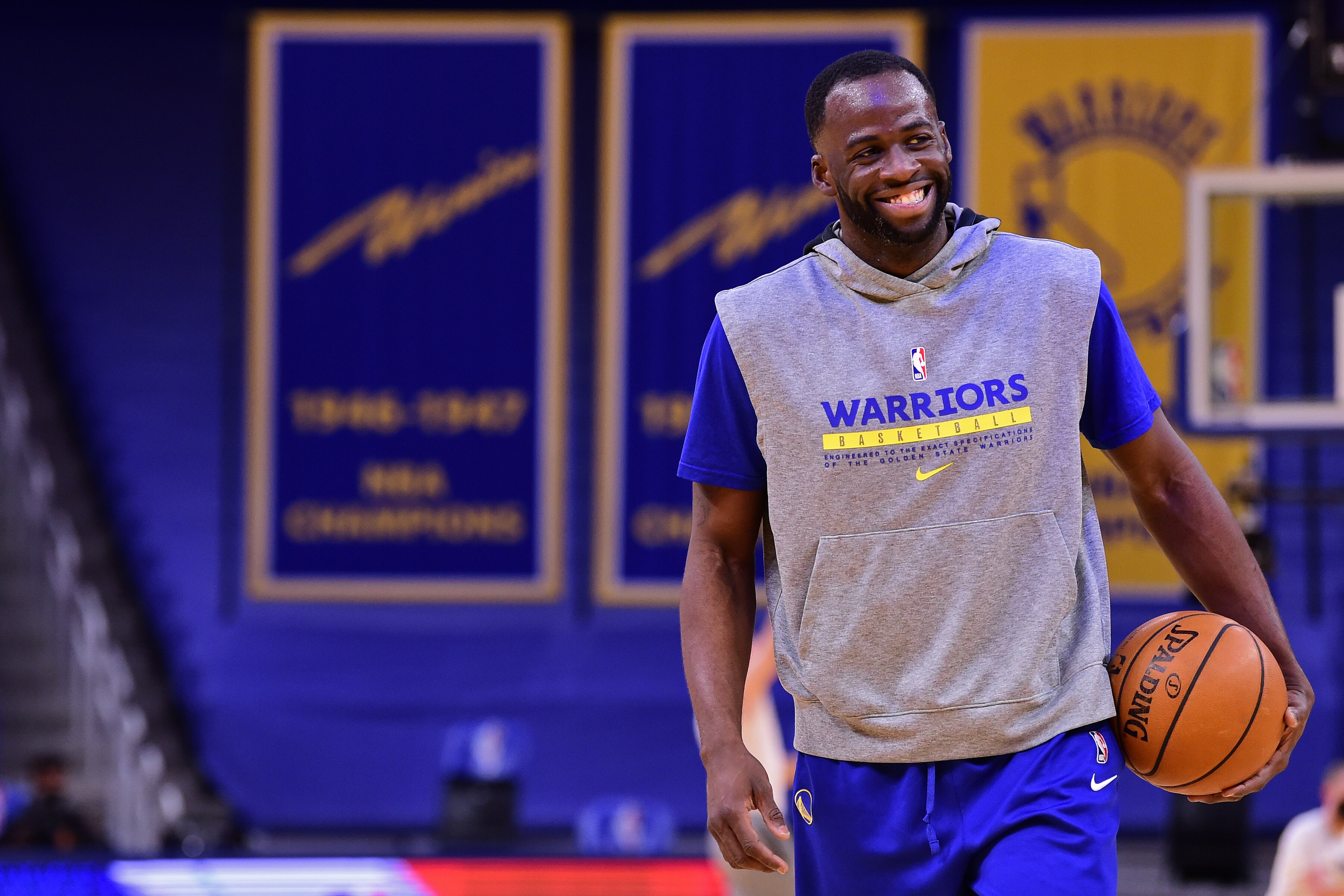 SAN FRANCISCO, CA - MARCH 15: Draymond Green #23 of the Golden State Warriors smiles before the game against the Los Angeles Lakers on March 15, 2021 at Chase Center in San Francisco, California. NOTE TO USER: User expressly acknowledges and agrees that, by downloading and or using this photograph, user is consenting to the terms and conditions of Getty Images License Agreement. Mandatory Copyright Notice: Copyright 2021 NBAE (Photo by Noah Graham/NBAE via Getty Images)