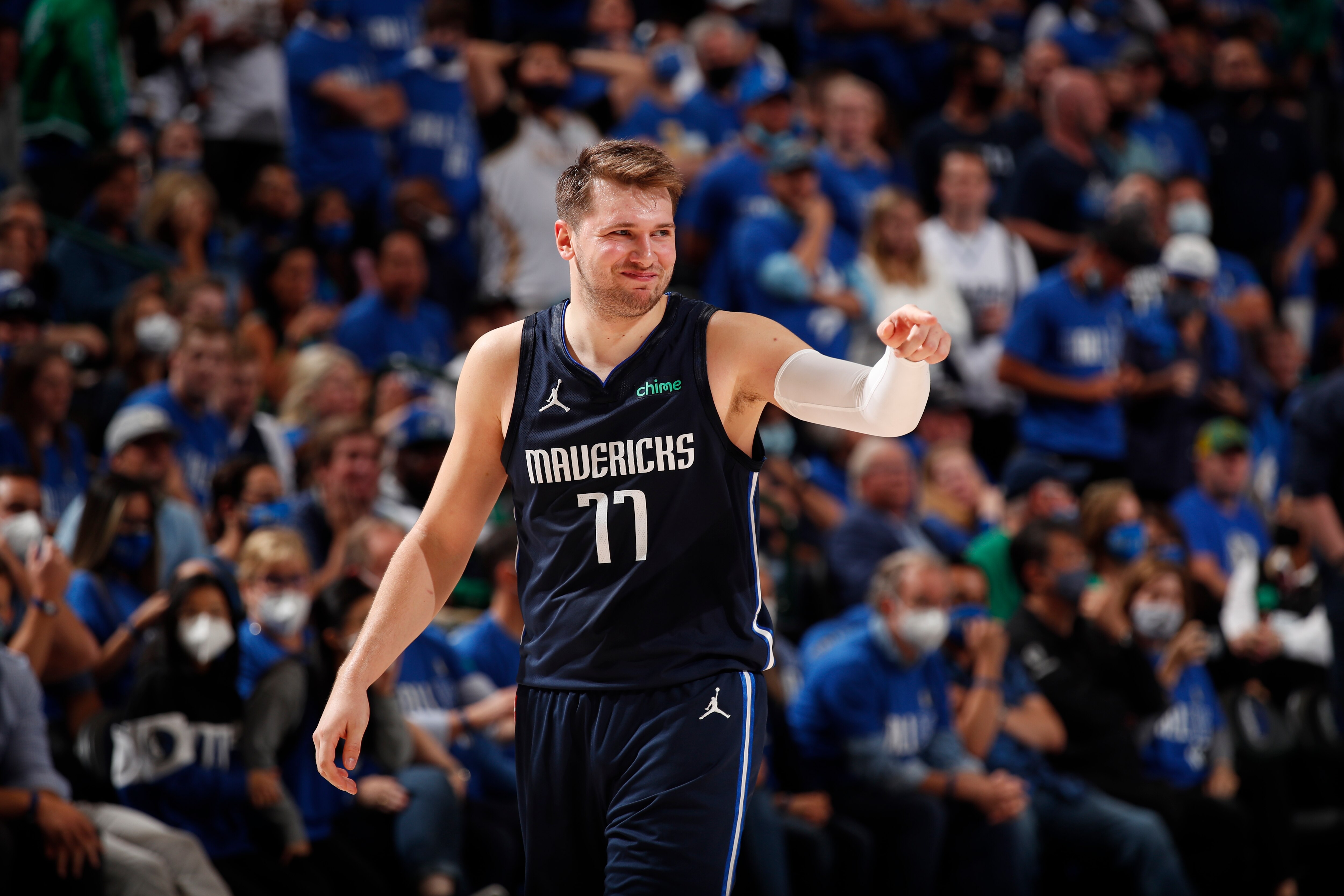 DALLAS, TX - MAY 28: Luka Doncic #77 of the Dallas Mavericks smiles during the game against the LA Clippers during Round 1, Game 3 of the 2021 NBA Playoffs on May 28, 2021 at the American Airlines Center in Dallas, Texas. NOTE TO USER: User expressly acknowledges and agrees that, by downloading and or using this photograph, User is consenting to the terms and conditions of the Getty Images License Agreement. Mandatory Copyright Notice: Copyright 2021 NBAE (Photo by Jeff Haynes/NBAE via Getty Images)