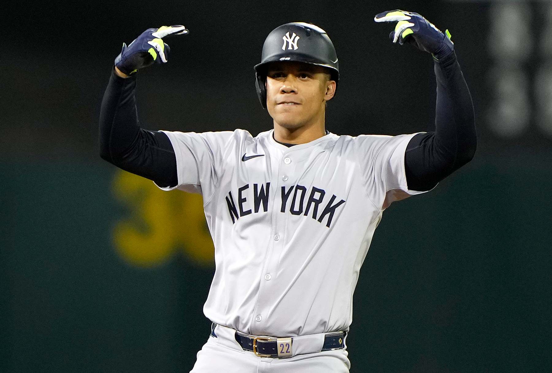 OAKLAND, CALIFORNIA - SEPTEMBER 20: Juan Soto #22 of the New York Yankees standing on second base celebrating after he hit a pinch-hit rbi double scoring Oswaldo Cabrera #95 against the Oakland Athletics in the top of the 10th inning at the Oakland Coliseum on September 20, 2024 in Oakland, California. (Photo by Thearon W. Henderson/Getty Images)