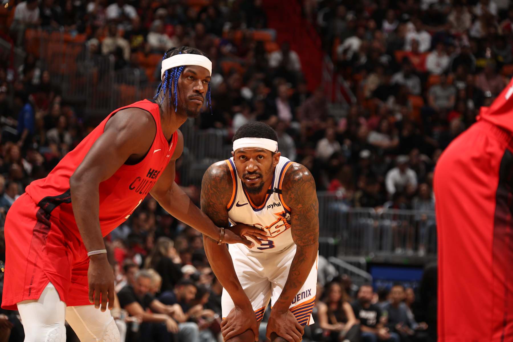 MIAMI, FL - DECEMBER 7: Bradley Beal #3 of the Phoenix Suns and Jimmy Butler #22 of the Miami Heat look on during the game between the against the Phoenix Suns against the Miami Heat on December 7, 2024 at Kaseya Center in Miami, Florida. NOTE TO USER: User expressly acknowledges and agrees that, by downloading and or using this Photograph, user is consenting to the terms and conditions of the Getty Images License Agreement. Mandatory Copyright Notice: Copyright 2024 NBAE (Photo by Issac Baldizon/NBAE via Getty Images)