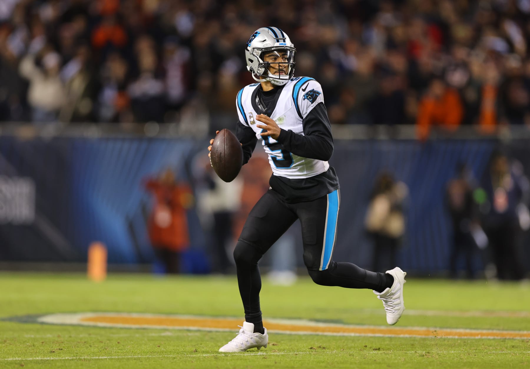 CHICAGO, ILLINOIS - NOVEMBER 09: Bryce Young #9 of the Carolina Panthers looks to pass during the fourth quarter against the Chicago Bears at Soldier Field on November 09, 2023 in Chicago, Illinois. (Photo by Michael Reaves/Getty Images)