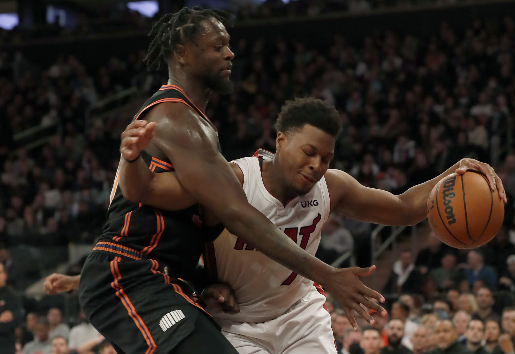 NEW YORK, NEW YORK - FEBRUARY 25:  Kyle Lowry #7 of the Miami Heat is fouled during the fourth quarter by Julius Randle #30 of the New York Knicks at Madison Square Garden on February 25, 2022 in New York City. NOTE TO USER: User expressly acknowledges and agrees that, by downloading and or using this photograph, User is consenting to the terms and conditions of the Getty Images License Agreement. (Photo by Jim McIsaac/Getty Images)