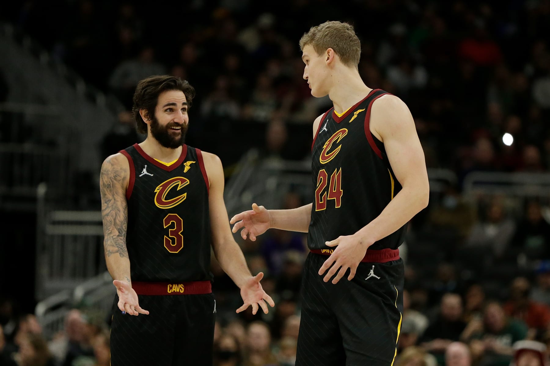 MILWAUKEE, WISCONSIN - DECEMBER 18: Ricky Rubio #3 of the Cleveland Cavaliers talks with Lauri Markkanen #24 during the second half of the game against the Milwaukee Bucks at Fiserv Forum on December 18, 2021 in Milwaukee, Wisconsin. NOTE TO USER: User expressly acknowledges and agrees that, by downloading and or using this photograph, User is consenting to the terms and conditions of the Getty Images License Agreement. (Photo by John Fisher/Getty Images)