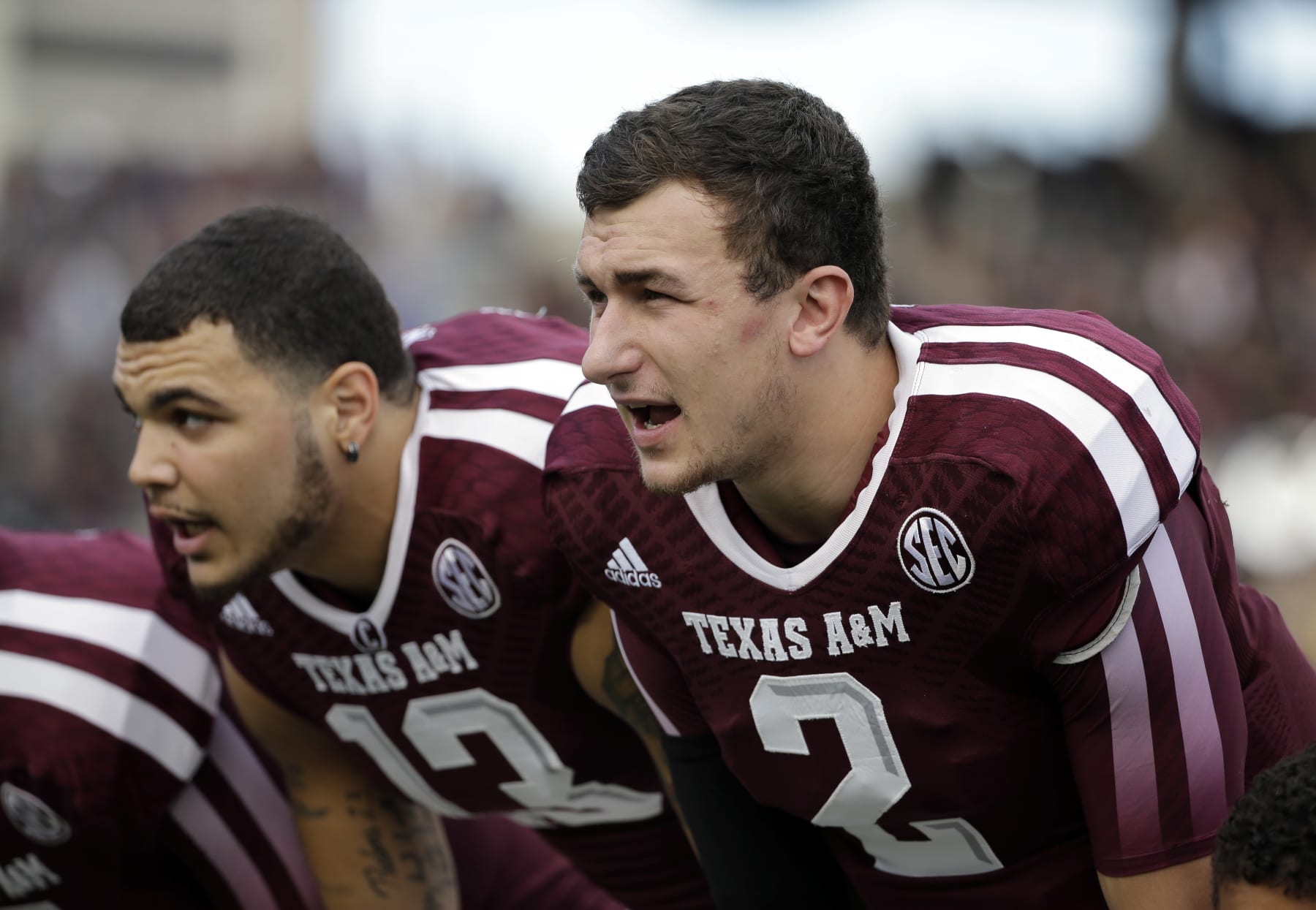 Texas A&M quarterback Johnny Manziel (2) and wide receiver Mike Evans (13) sing a school song before an NCAA college football game against Mississippi State Saturday, Nov. 9, 2013, in College Station, Texas. (AP Photo/David J. Phillip)