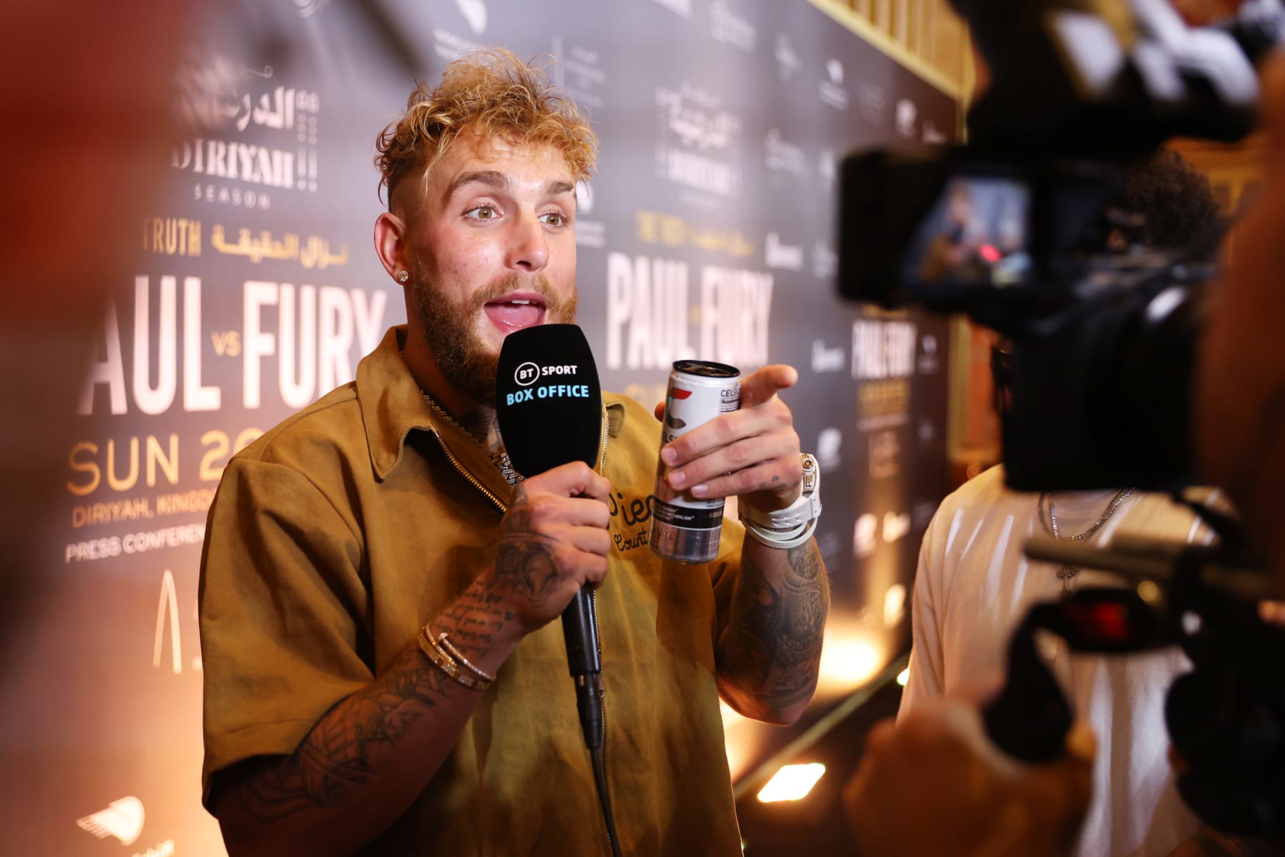 RIYADH, SAUDI ARABIA - FEBRUARY 23: Jake Paul is interviewed prior to the Jake Paul v Tommy Fury Press Conference on February 23, 2023 in Riyadh, Saudi Arabia. (Photo by Francois Nel/Getty Images)