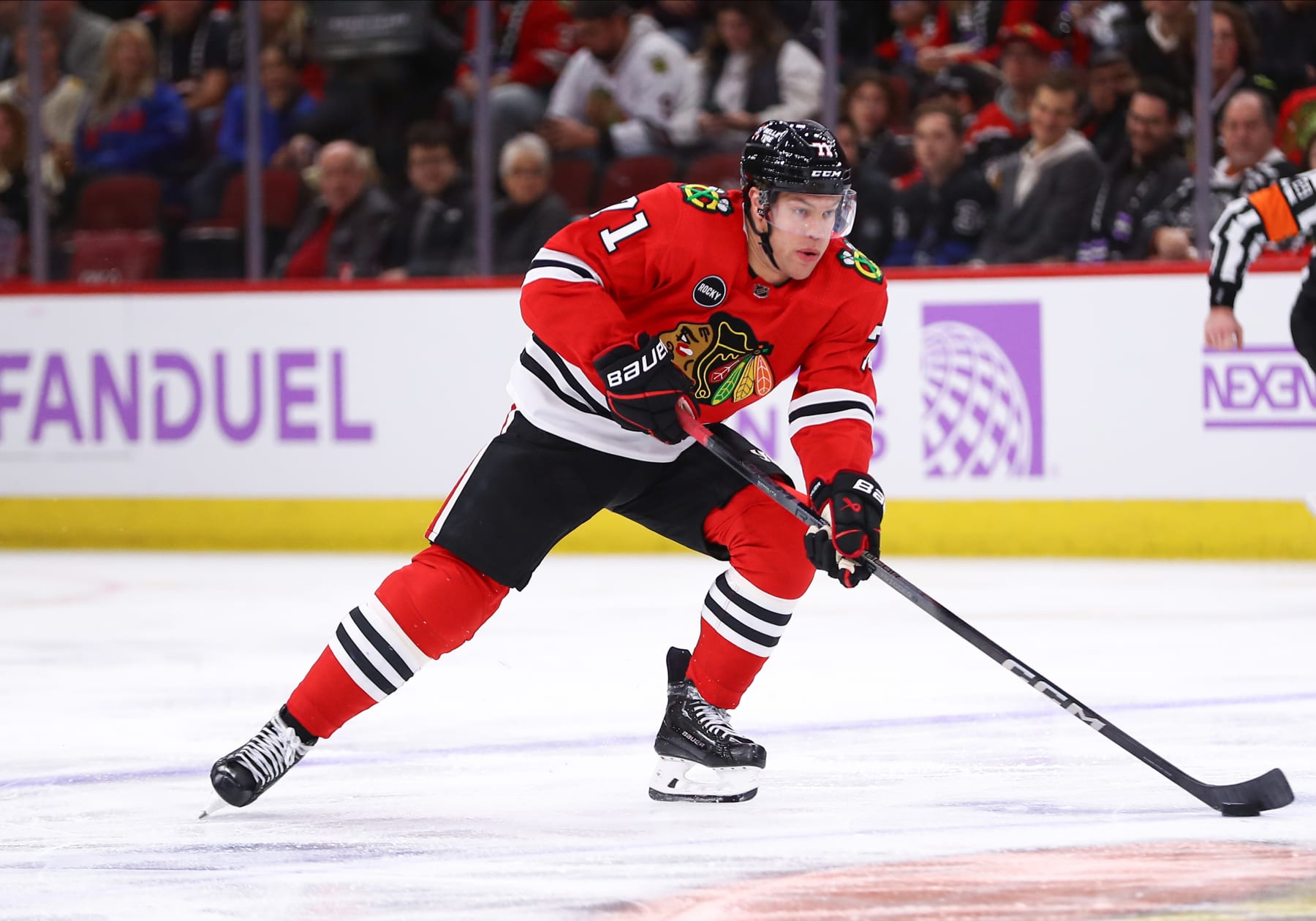 CHICAGO, IL - NOVEMBER 19: Taylor Hall #71 of the Chicago Blackhawks brings the puck up ice during the third period against the Buffalo Sabres at the United Center on November 19, 2023 in Chicago, Illinois. (Photo by Melissa Tamez/Icon Sportswire via Getty Images)