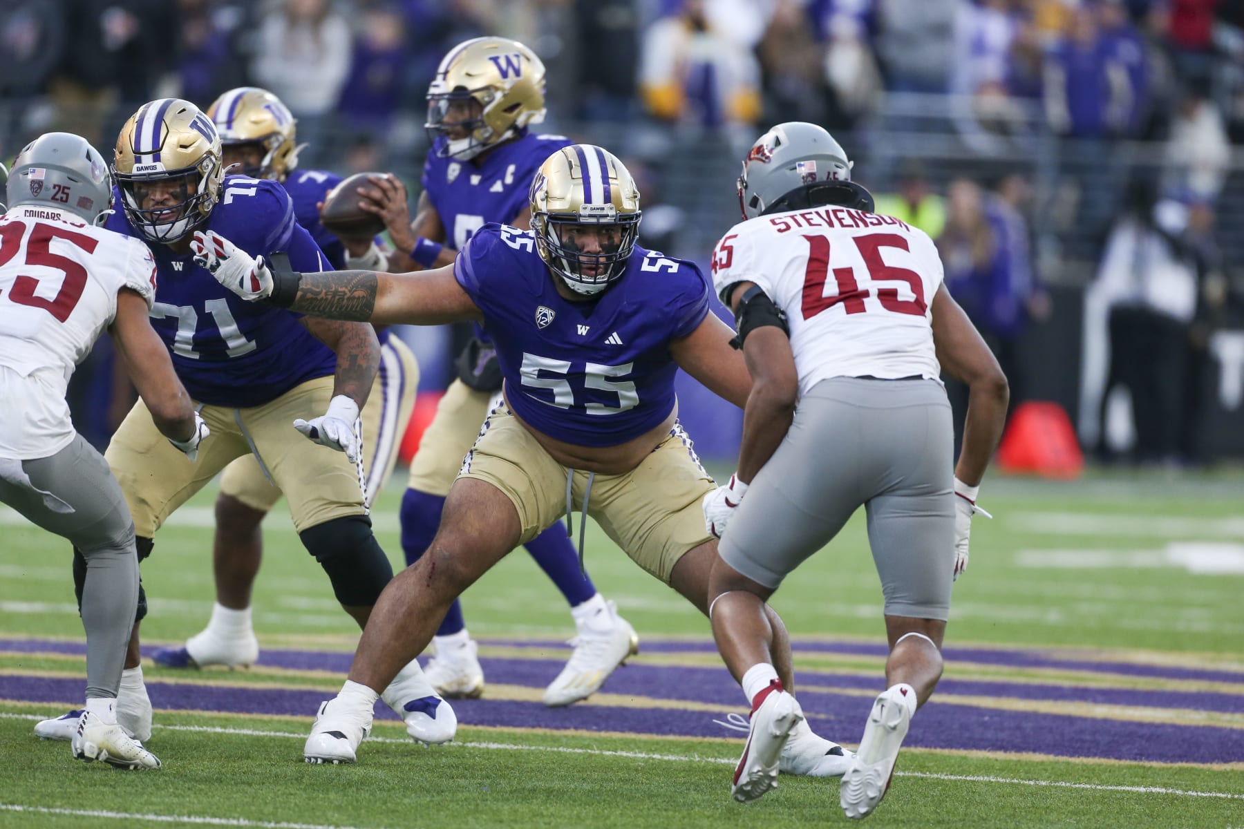 SEATTLE, WA - NOVEMBER 25:  Washington's #55 (OL) Troy Fautanu during the 115th Apple Cup college football game between the Washington Huskies versus the Washington State Cougars on November 25, 2023, at Husky Stadium in Seattle, WA. (Photo by Jesse Beals/Icon Sportswire via Getty Images)