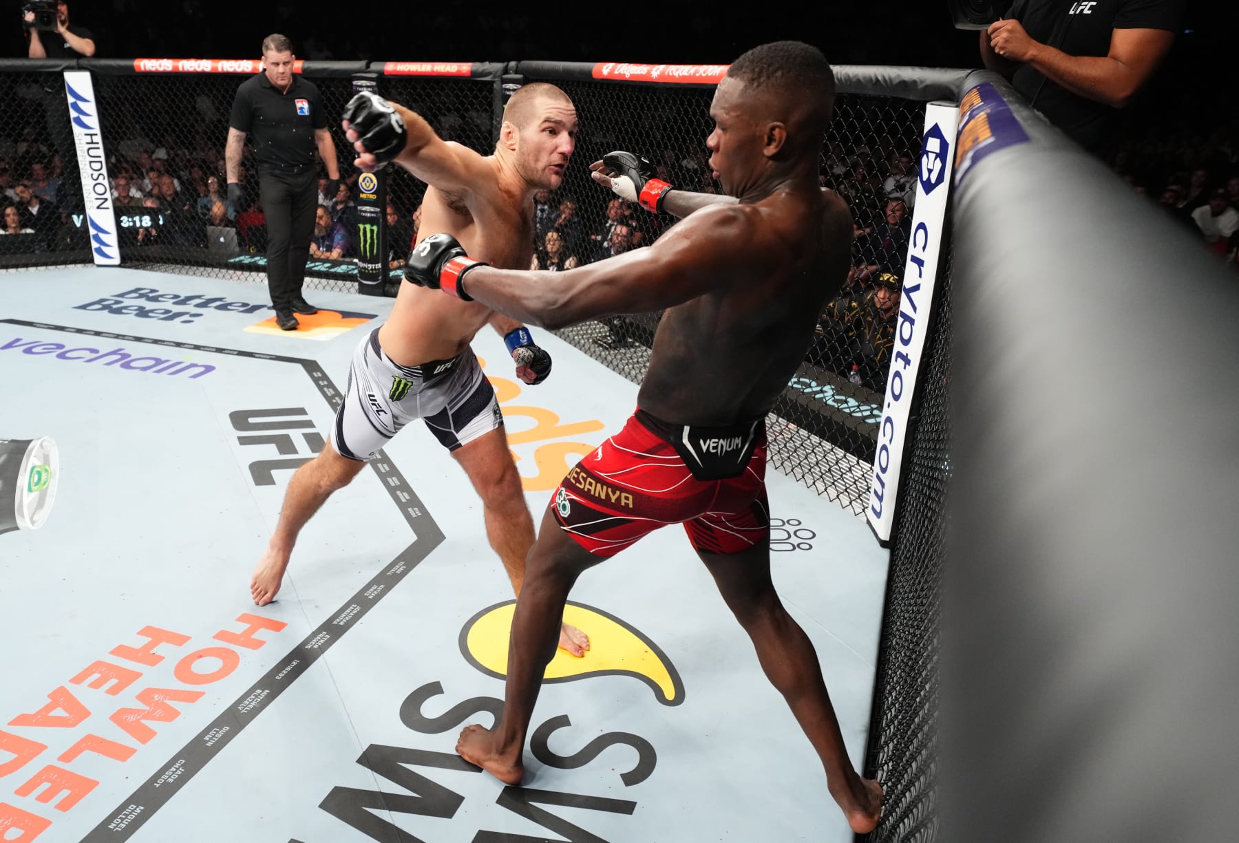 SYDNEY, AUSTRALIA - SEPTEMBER 10: (L-R) Sean Strickland punches Israel Adesanya of Nigeria in the UFC middleweight championship fight during the UFC 293 event at Qudos Bank Arena on September 10, 2023 in Sydney, Australia. (Photo by Chris Unger/Zuffa LLC via Getty Images)