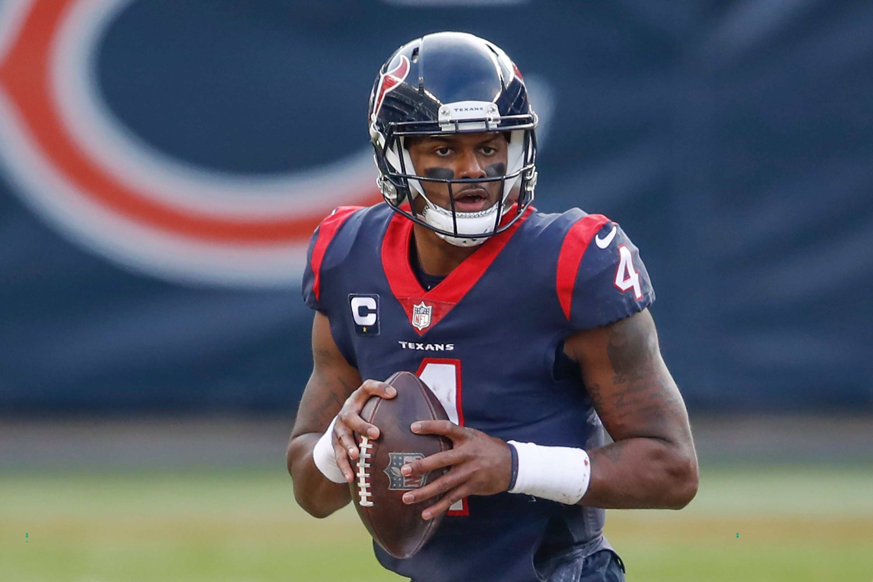 Houston Texans quarterback Deshaun Watson (4) looks to pass the ball during the second half of an NFL football game against the Chicago Bears, Sunday, Dec. 13, 2020, in Chicago. (AP Photo/Kamil Krzaczynski)