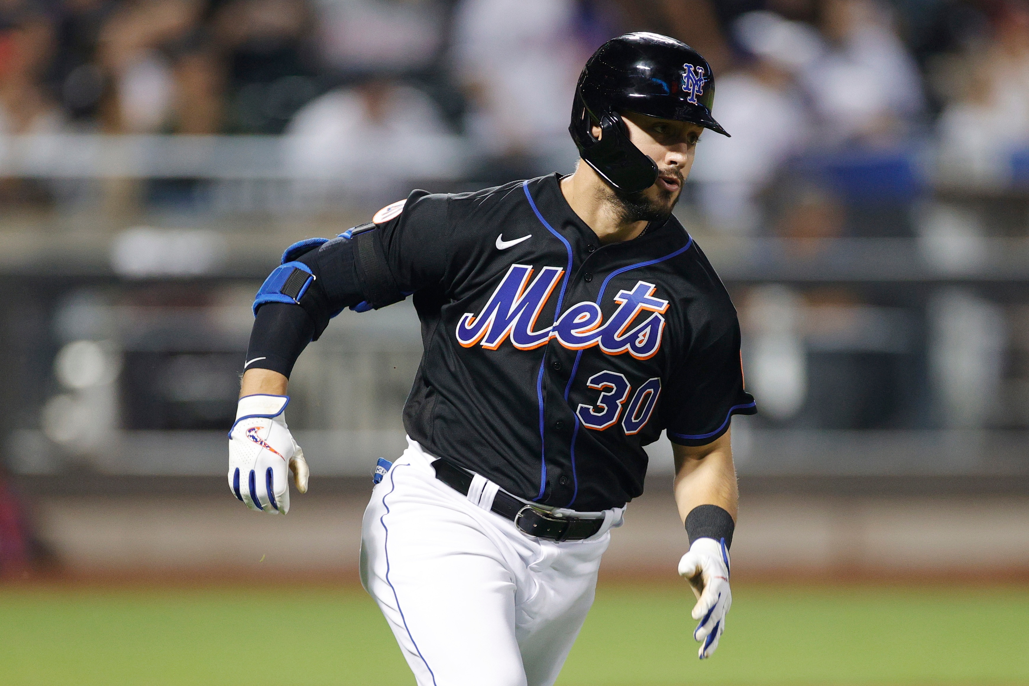 NEW YORK, NEW YORK - SEPTEMBER 17: Michael Conforto #30 of the New York Mets hits an RBI double during the eighth inning against the Philadelphia Phillies at Citi Field on September 17, 2021 in the Queens borough of New York City. (Photo by Sarah Stier/Getty Images)