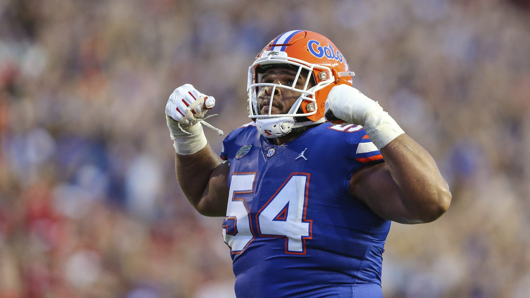 Florida offensive lineman O'Cyrus Torrence (54) celebrates a near touchdown during the first half of an NCAA football game against Utah on Saturday, Sept. 3, 2022 in Gainesville, Fla. (AP Photo/Gary McCullough)