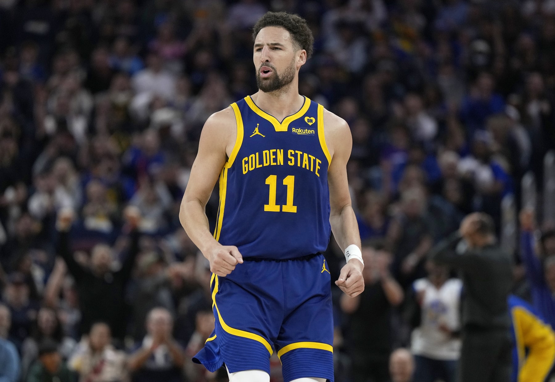 SAN FRANCISCO, CALIFORNIA - APRIL 07: Klay Thompson #11 of the Golden State Warriors reacts after making a three-point shot against the Utah Jazz during first half of an NBA basketball game at Chase Center on April 07, 2024 in San Francisco, California. NOTE TO USER: User expressly acknowledges and agrees that, by downloading and or using this photograph, User is consenting to the terms and conditions of the Getty Images License Agreement. (Photo by Thearon W. Henderson/Getty Images)