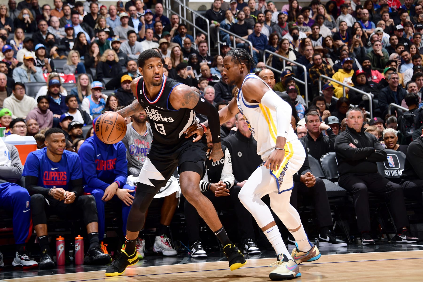 LOS ANGELES, CA - MARCH 15: Paul George #13 of the LA Clippers handles the ball during the game against the Golden State Warriors on March 15, 2023 at Crypto.Com Arena in Los Angeles, California. NOTE TO USER: User expressly acknowledges and agrees that, by downloading and/or using this Photograph, user is consenting to the terms and conditions of the Getty Images License Agreement. Mandatory Copyright Notice: Copyright 2023 NBAE (Photo by Adam Pantozzi/NBAE via Getty Images)