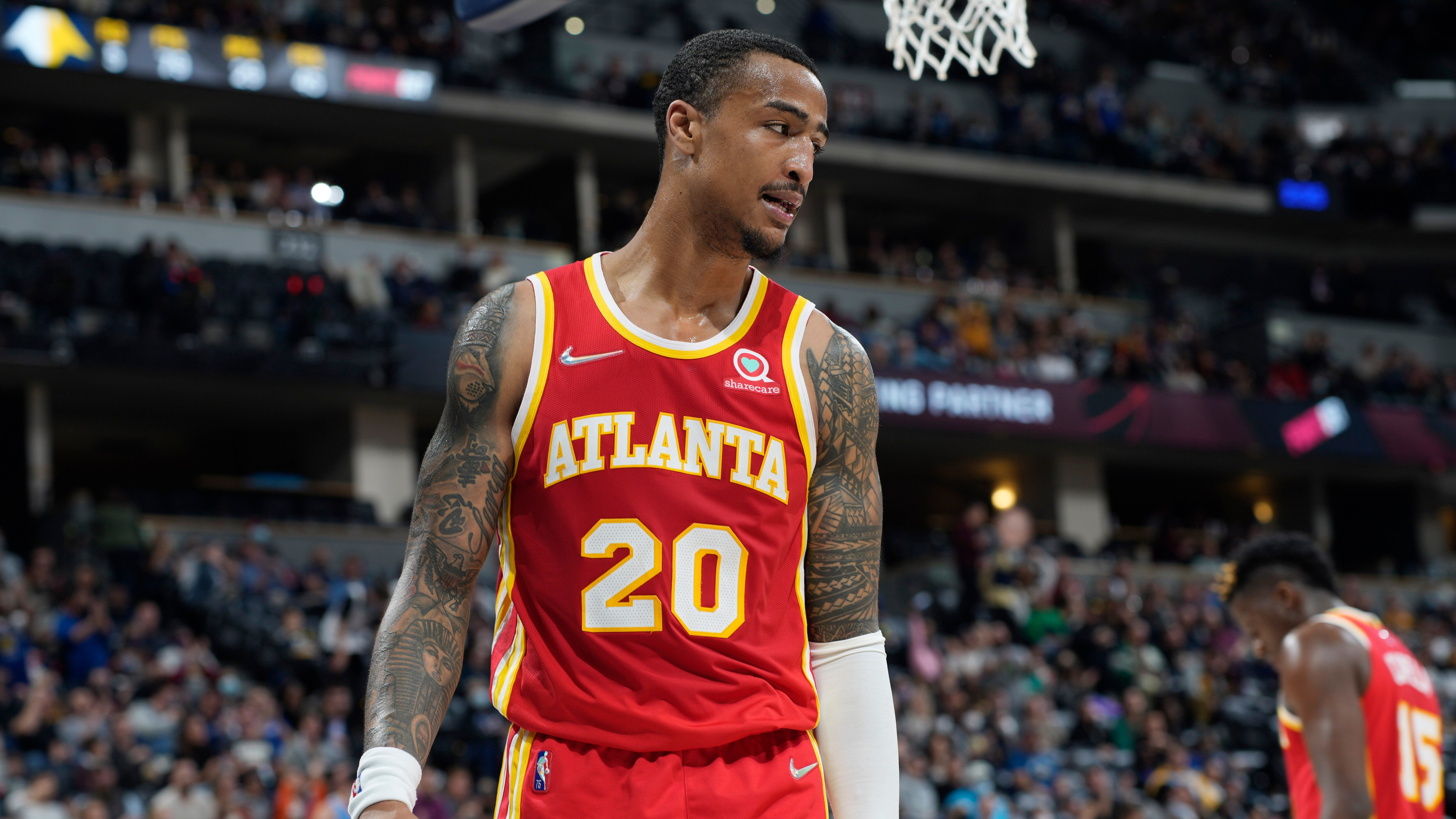 Atlanta Hawks forward John Collins (20) in the second half of an NBA basketball game Friday, Nov. 12, 2021, in Denver. The Nuggets won 105-96. (AP Photo/David Zalubowski)