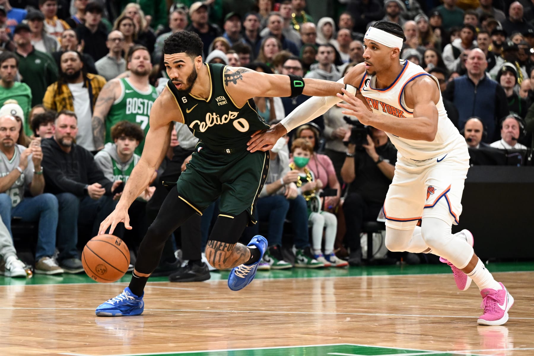 BOSTON, MASSACHUSETTS - MARCH 05: Jayson Tatum #0 of the Boston Celtics drives to the basket against Trevor Keels #3 of the New York Knicks during overtime at the TD Garden on March 05, 2023 in Boston, Massachusetts. NOTE TO USER: User expressly acknowledges and agrees that, by downloading and or using this photograph, User is consenting to the terms and conditions of the Getty Images License Agreement. (Photo by Brian Fluharty/Getty Images)