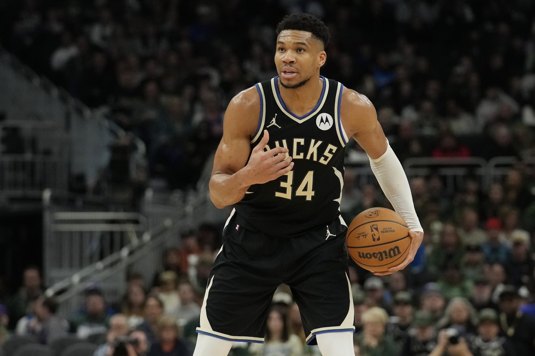 MILWAUKEE, WISCONSIN - APRIL 07: Giannis Antetokounmpo #34 of the Milwaukee Bucks dribbles the ball during the first half against the New York Knicks at Fiserv Forum on April 07, 2024 in Milwaukee, Wisconsin. NOTE TO USER: User expressly acknowledges and agrees that, by downloading and or using this photograph, User is consenting to the terms and conditions of the Getty Images License Agreement. (Photo by Patrick McDermott/Getty Images)