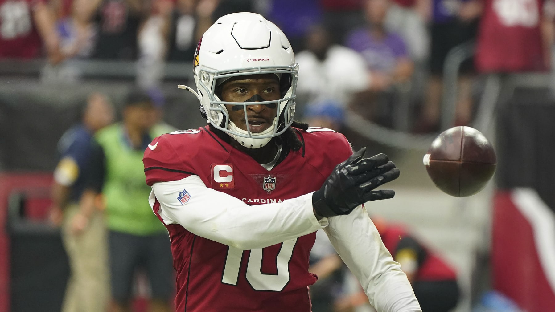 Arizona Cardinals wide receiver DeAndre Hopkins 10, throws the ball to an official after scoring a touchdown against the Minnesota Vikings during a football game Sunday, Sept 19, 2021, in Glendale, AZ. (AP Photo/Darryl Webb)